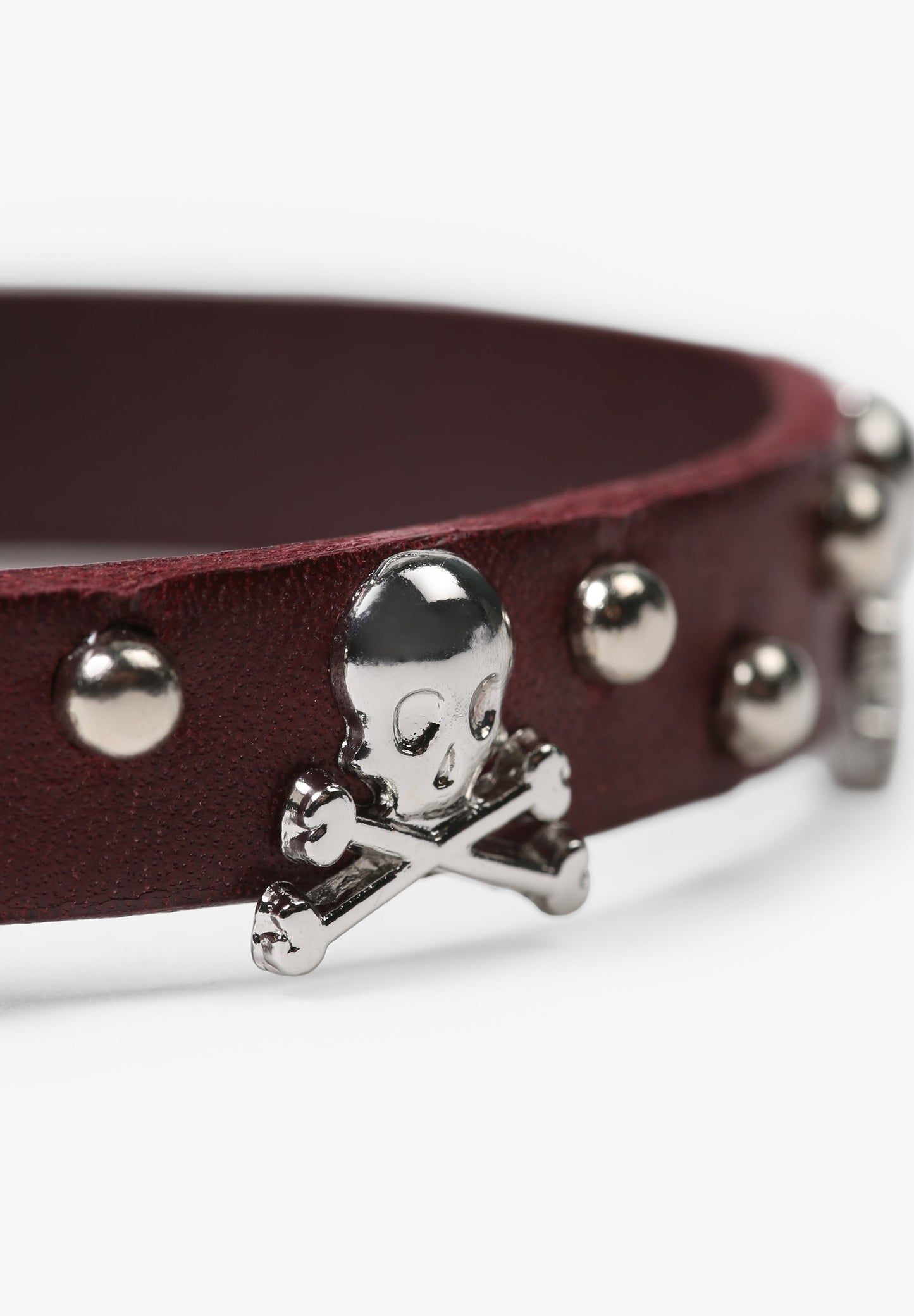 PULSEIRA COM SKULLS E TACHAS