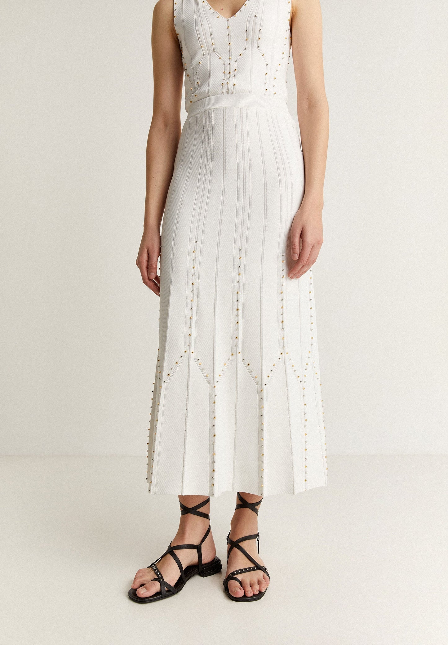 SAIA DE MALHA MIDI COM TACHAS