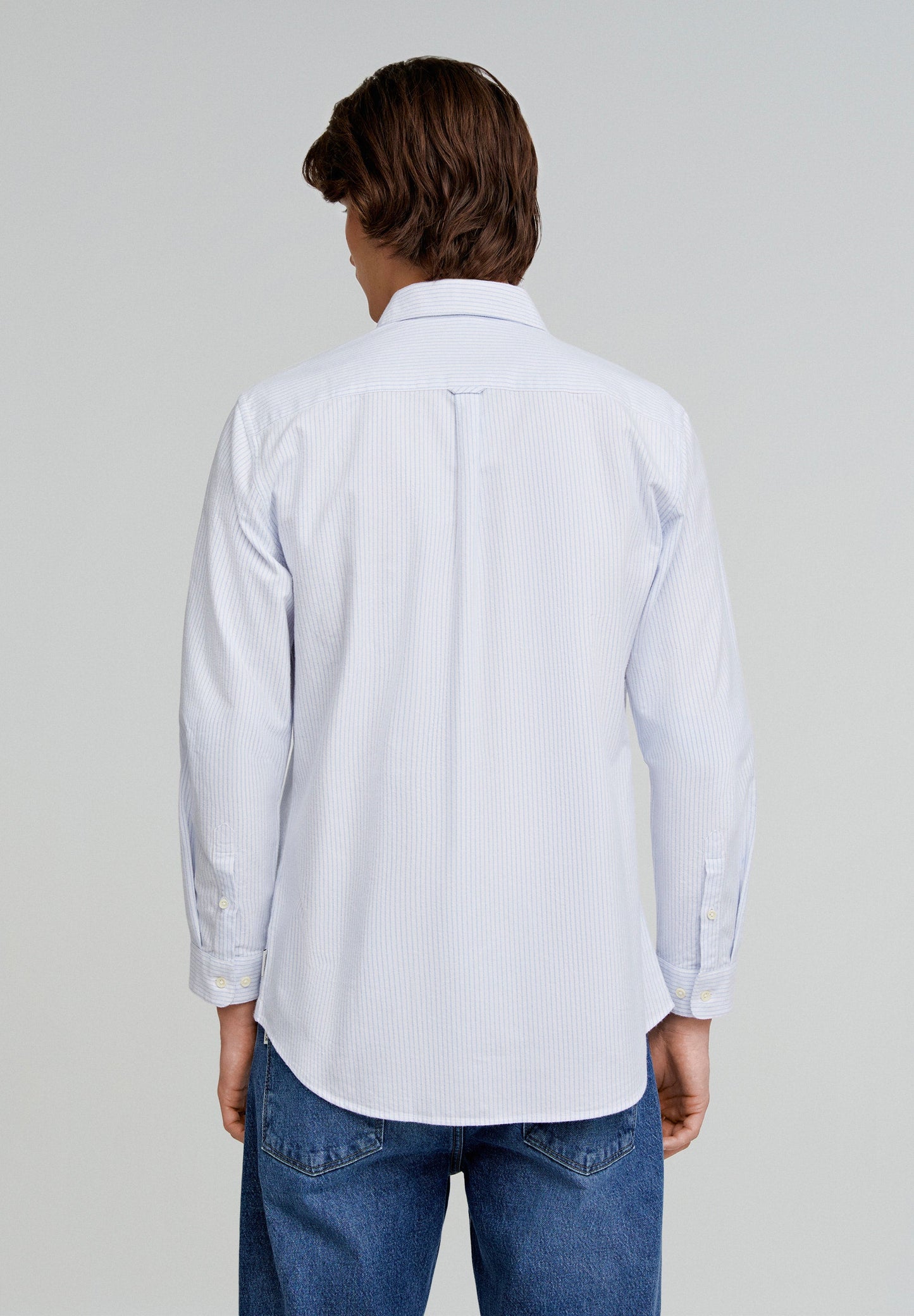 CAMISA ÀS RISCAS COM BOLSO COM SKULL E PLACKET