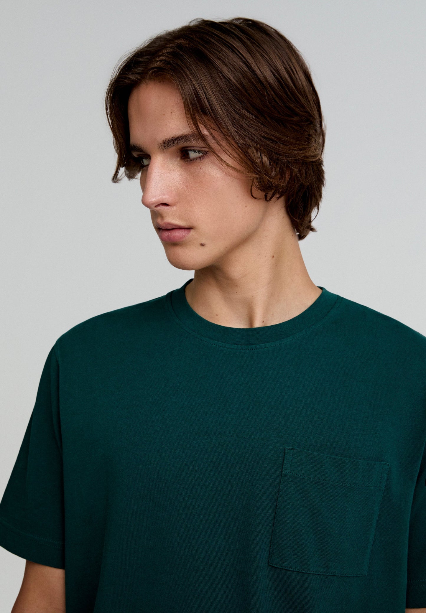 T-SHIRT COM BOLSO
