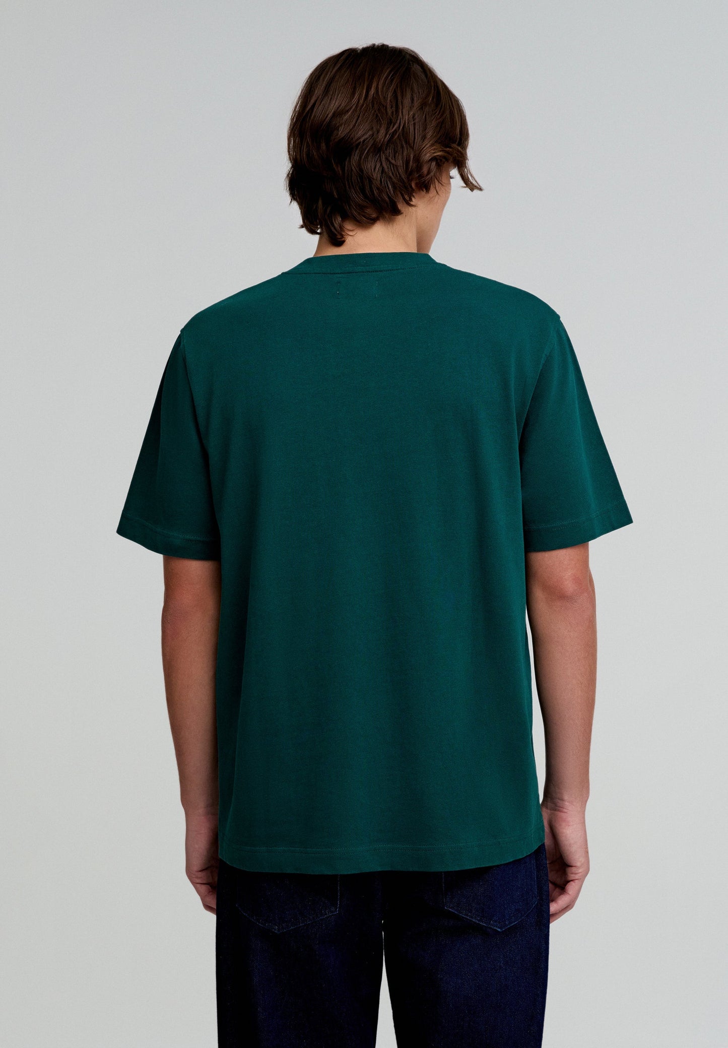 T-SHIRT COM BOLSO
