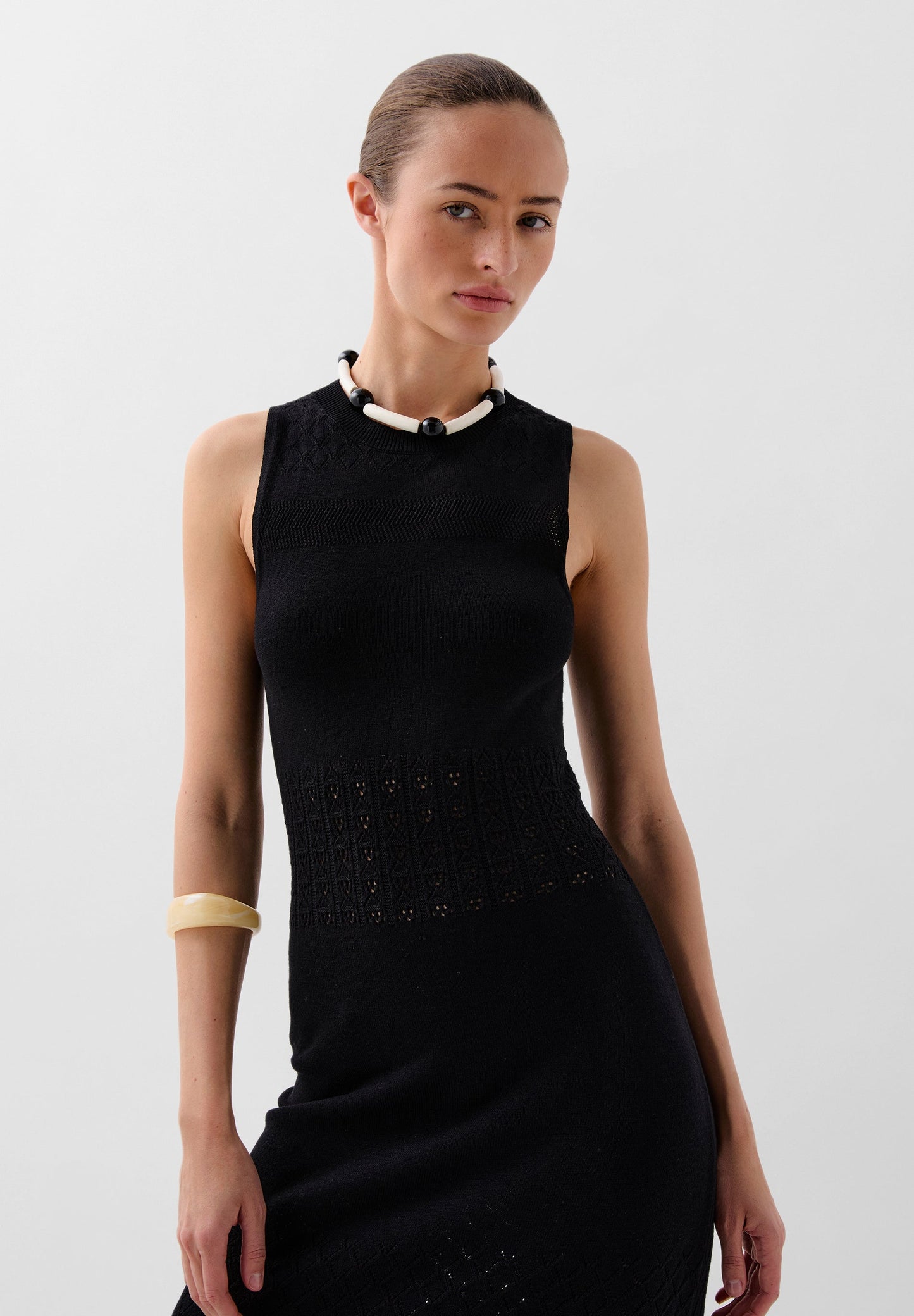 VESTIDO EM MALHA COM FRANJAS