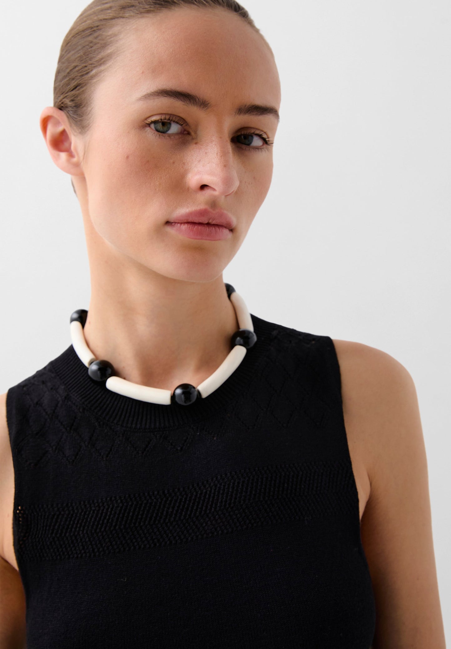 VESTIDO EM MALHA COM FRANJAS