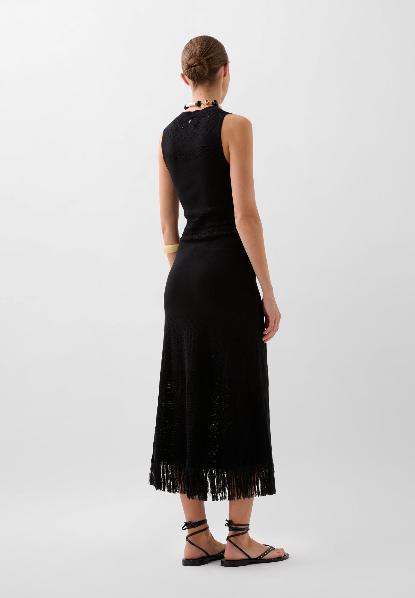 VESTIDO EM MALHA COM FRANJAS
