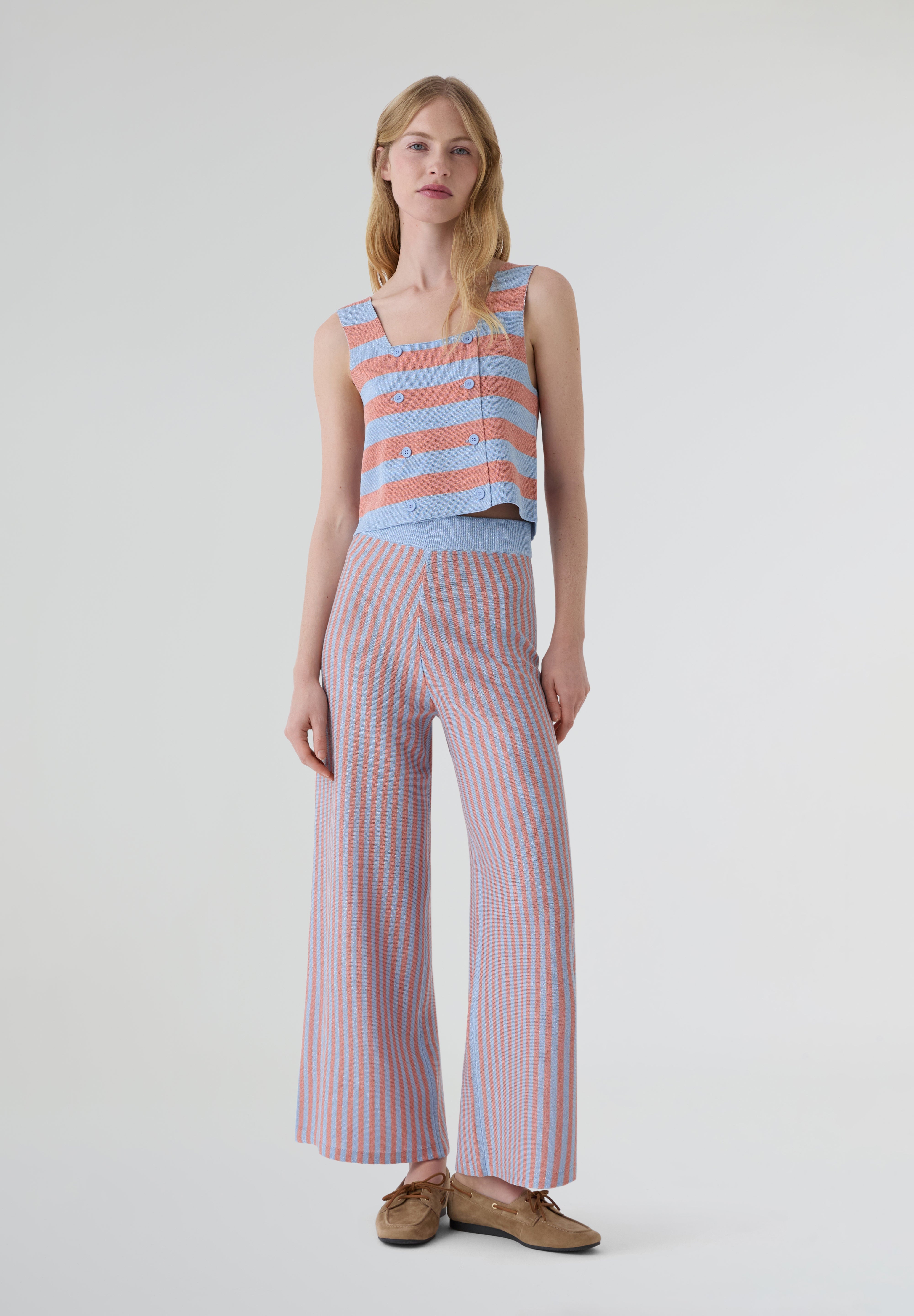 THE TINY BIG SISTER | CALÇAS DE MALHA ÀS RISCAS