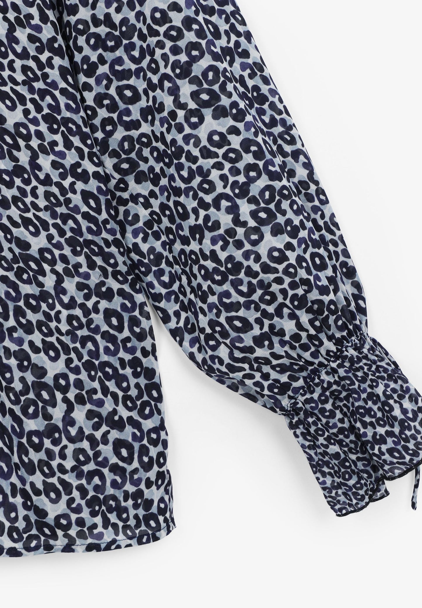 BLUSA SEMITRANSPARENTE COM ANIMAL PRINT