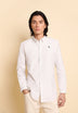 CAMISA ÀS RISCAS COLARINHO COM BOTÕES