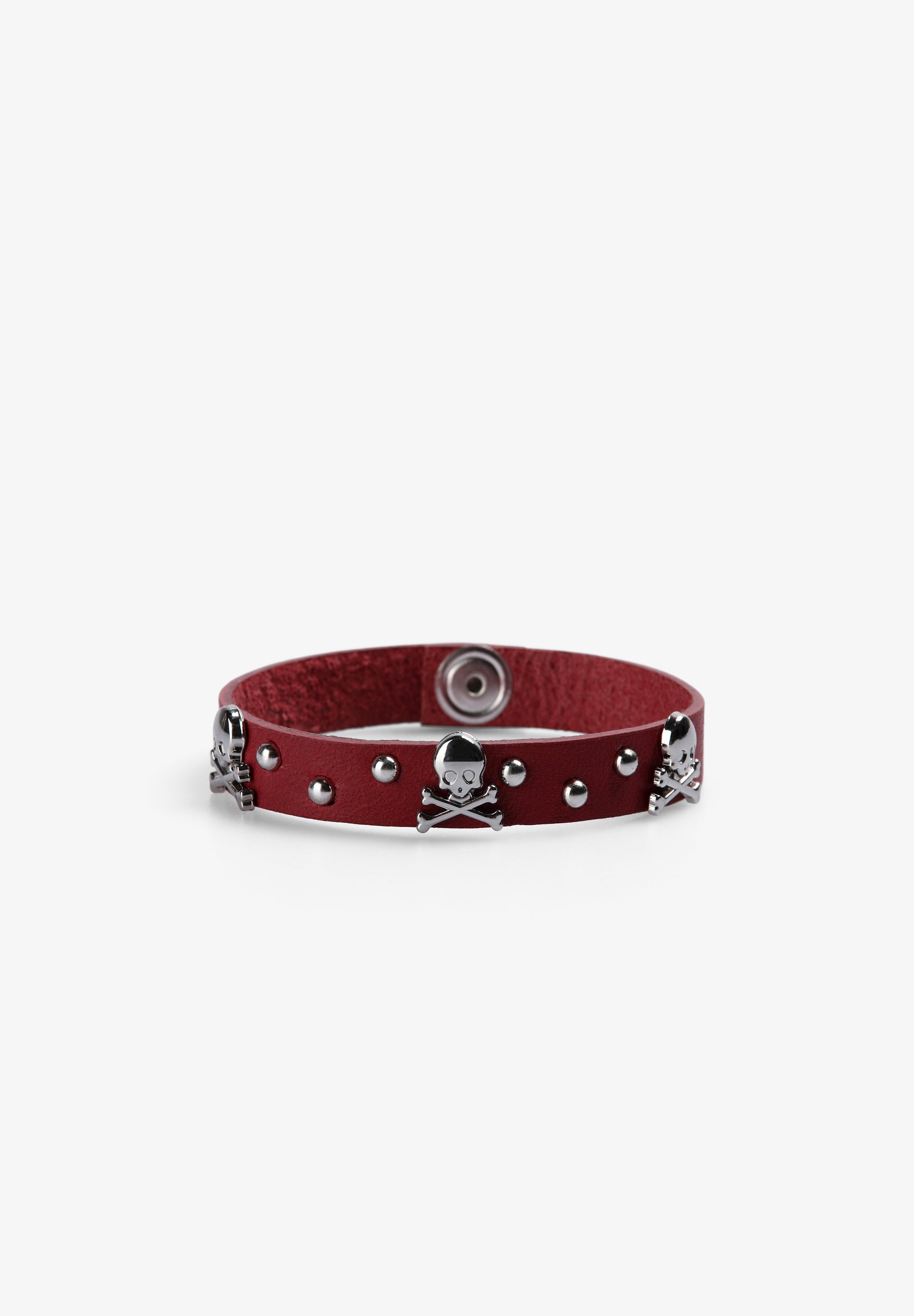 PULSEIRA COM SKULLS E TACHAS