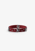 PULSEIRA COM SKULLS E TACHAS