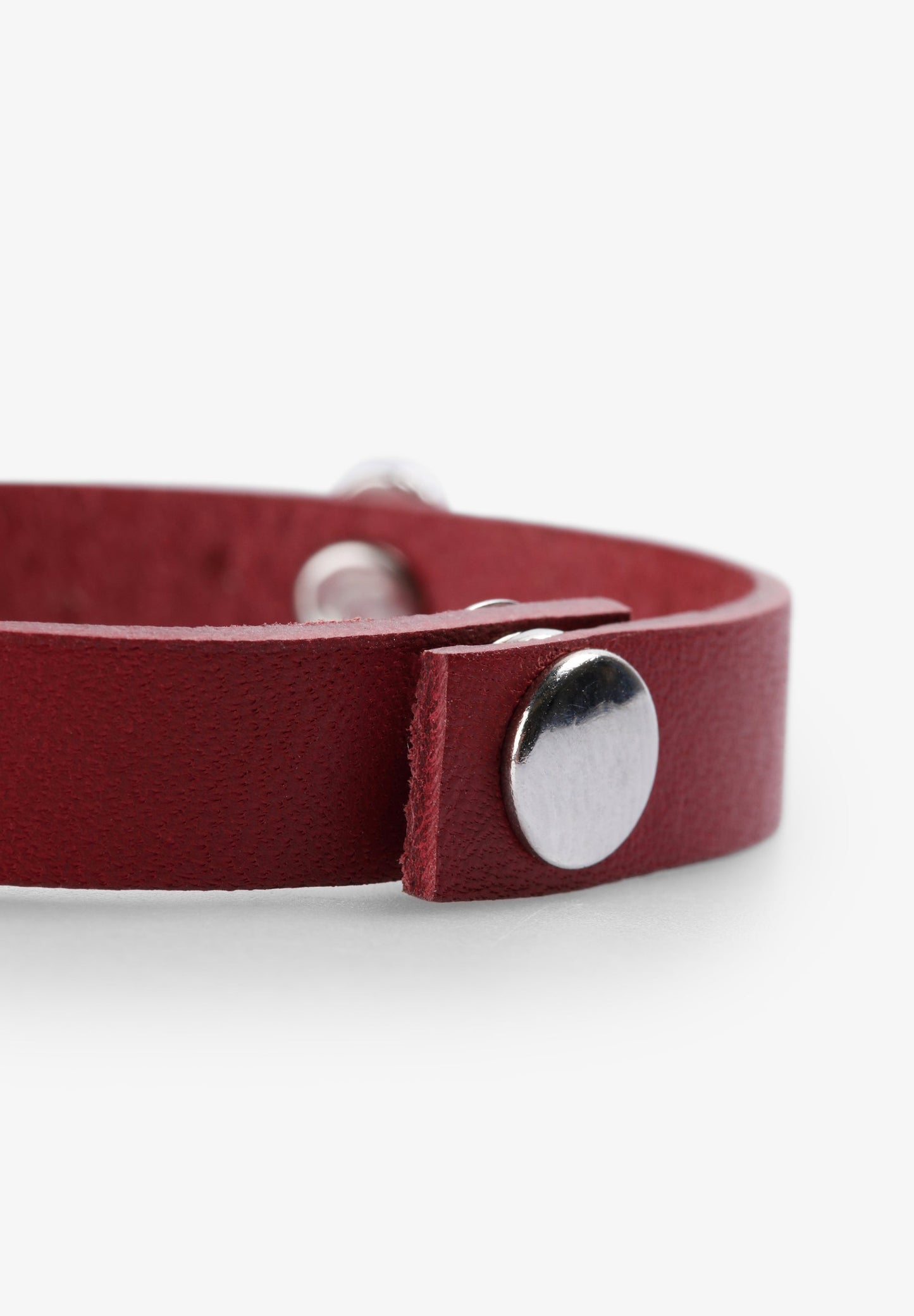 PULSEIRA COM SKULLS E TACHAS