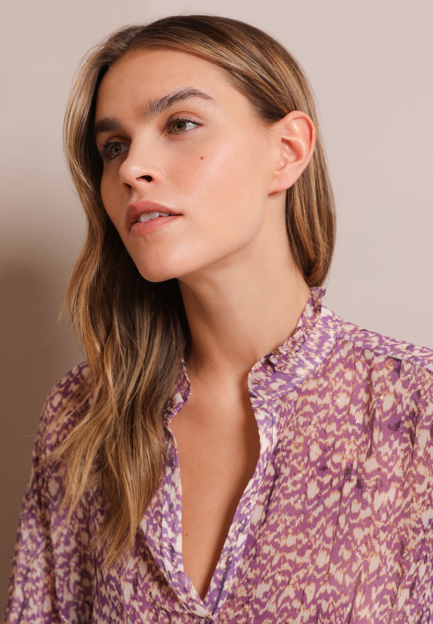 BLUSA COM PADRÃO METALIZADO