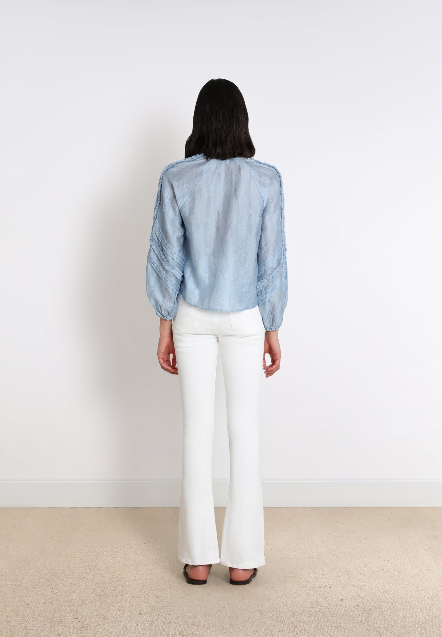 JEANS BOOTCUT COM COSTURA