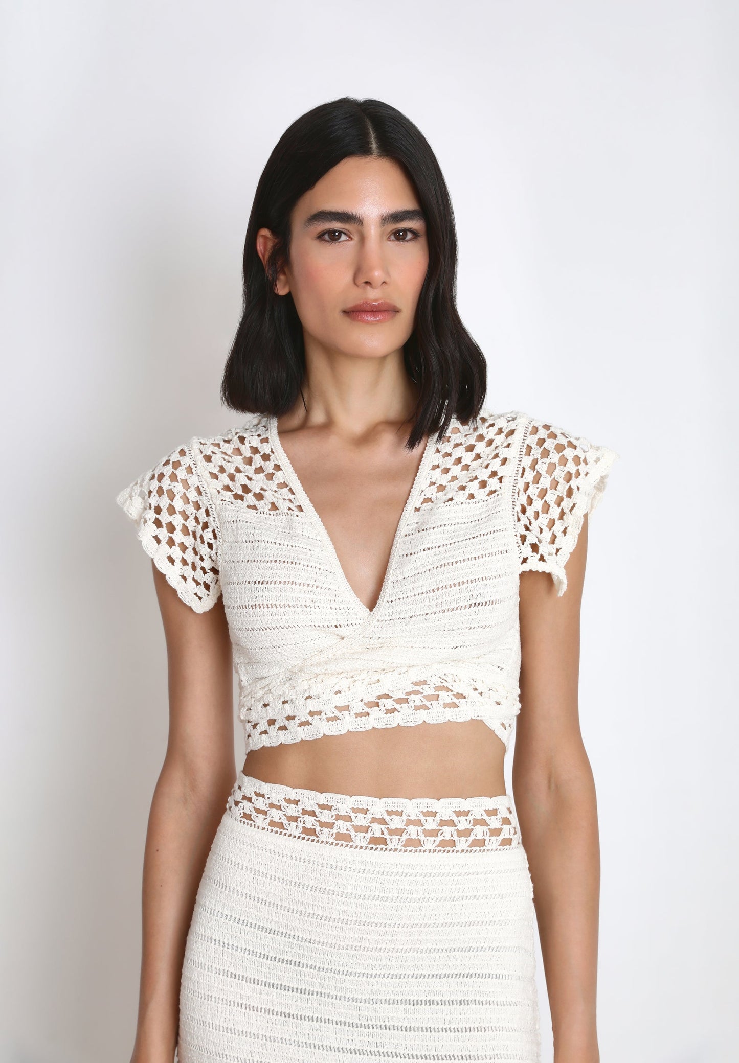 TOP DE MALHA MULTIPOSIÇÃO