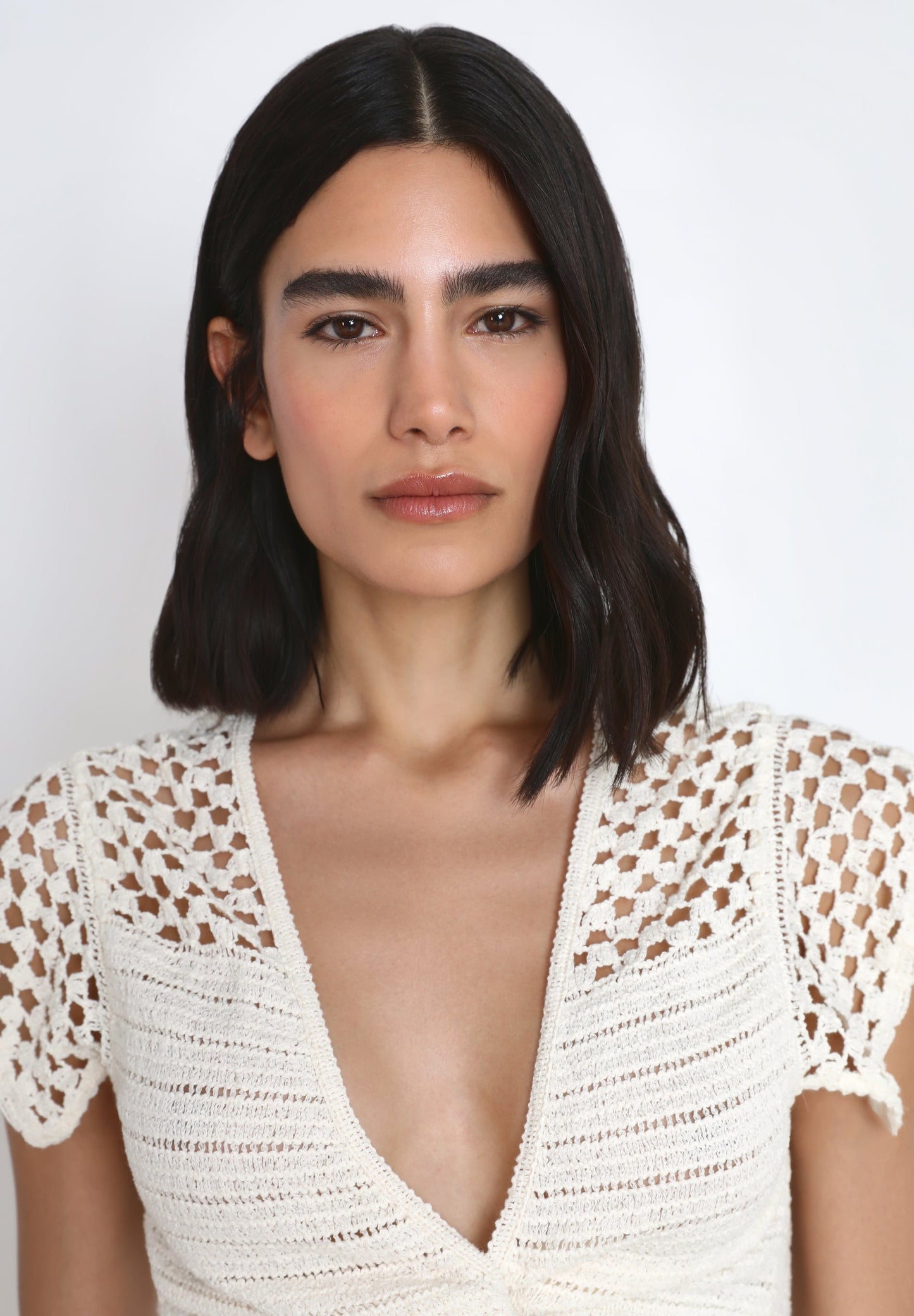 TOP DE MALHA MULTIPOSIÇÃO