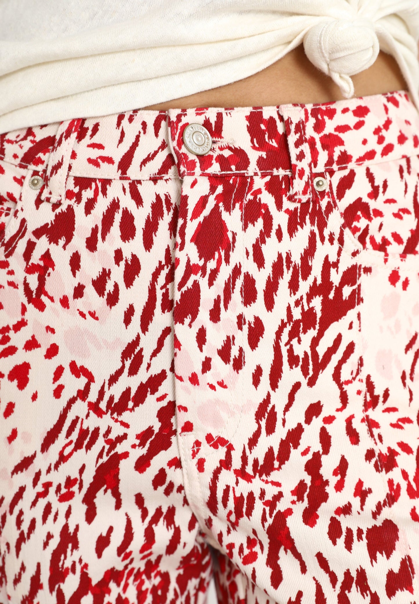 JEANS COM ESTAMPADO ANIMAL