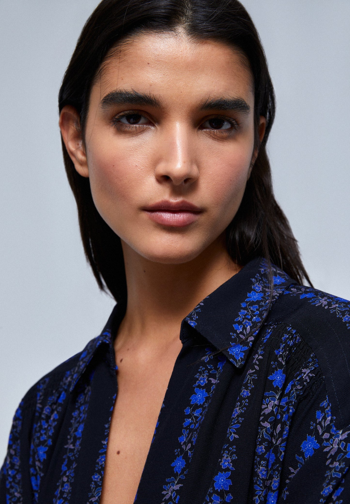 BLUSA ÀS RISCAS FLORAL