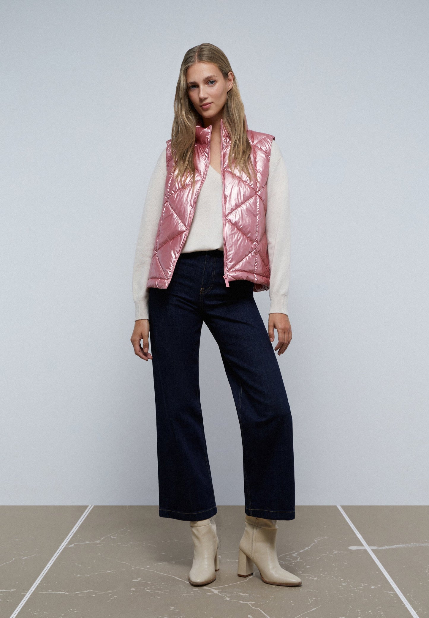 COLETE ACOLCHOADO COM GOLA SUBIDA