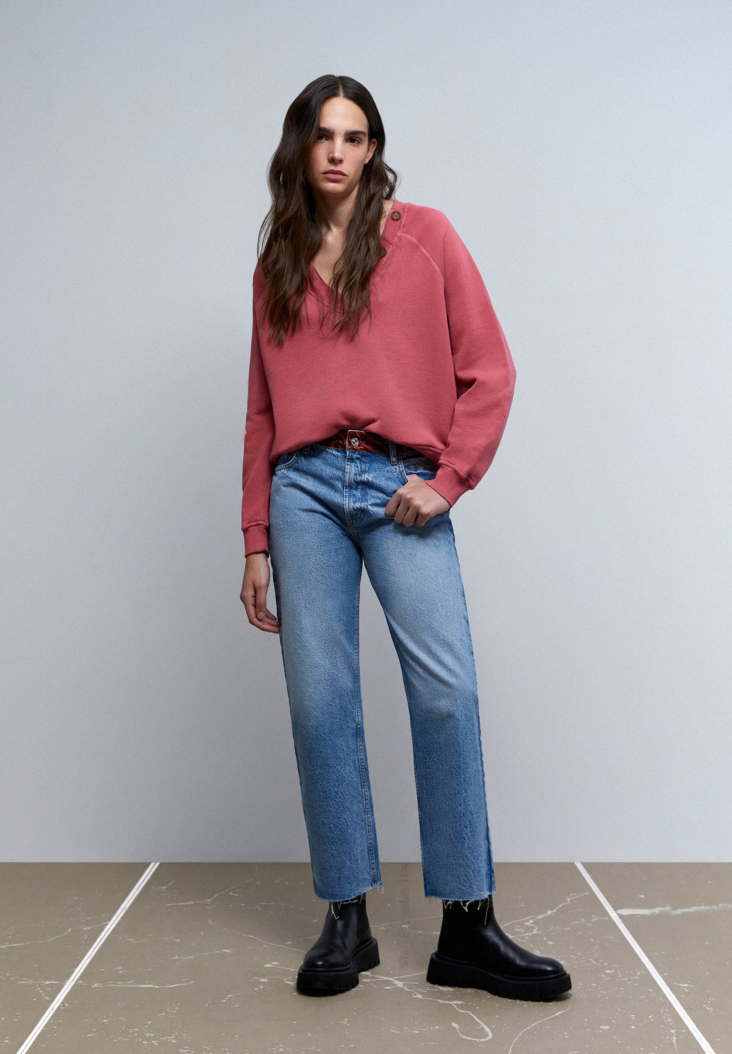 SWEATSHIRT COM BOTÕES NA GOLA