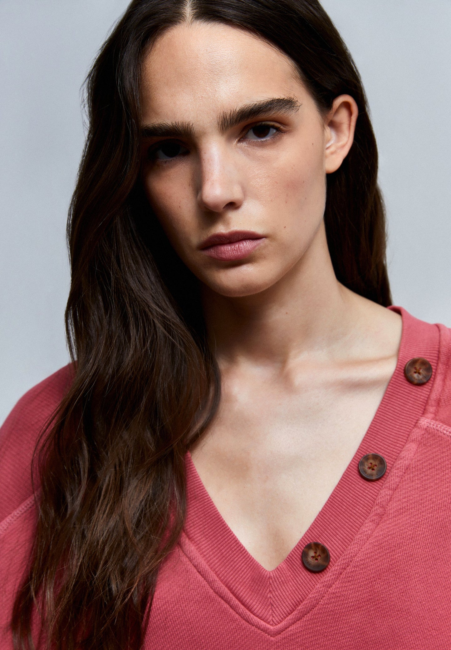 SWEATSHIRT COM BOTÕES NA GOLA