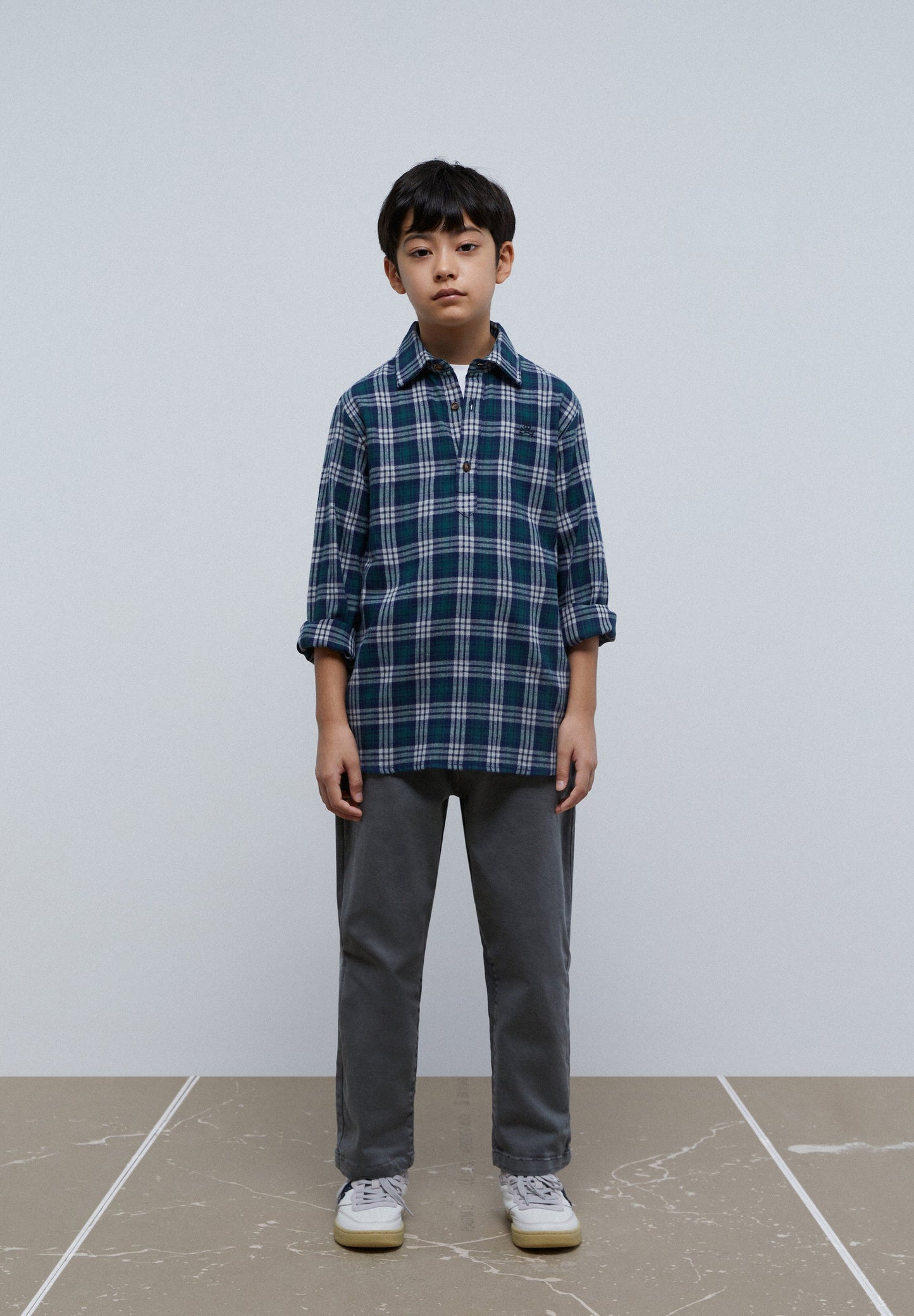 CAMISA POLO COM PADRÃO TARTAN