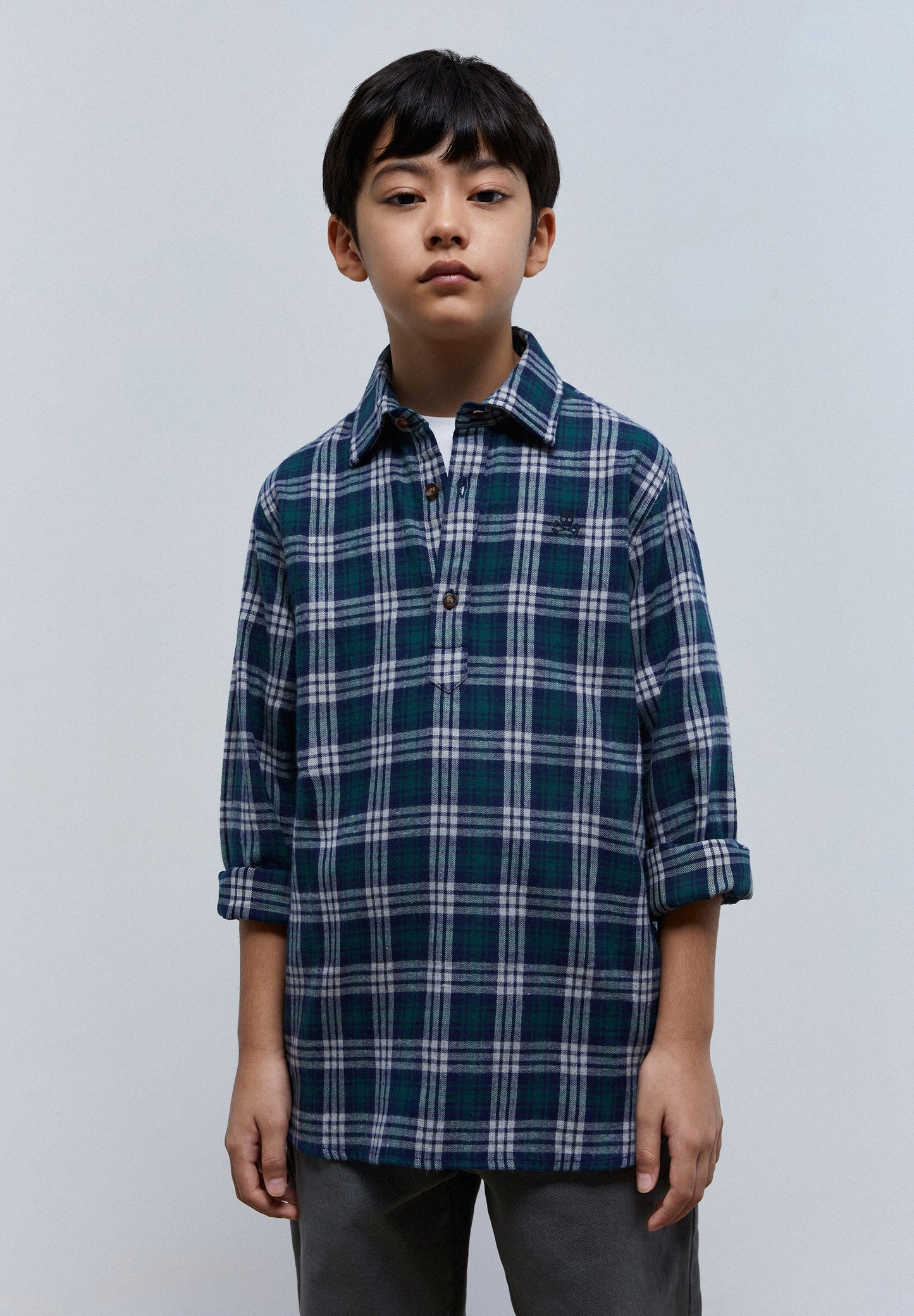 CAMISA POLO COM PADRÃO TARTAN