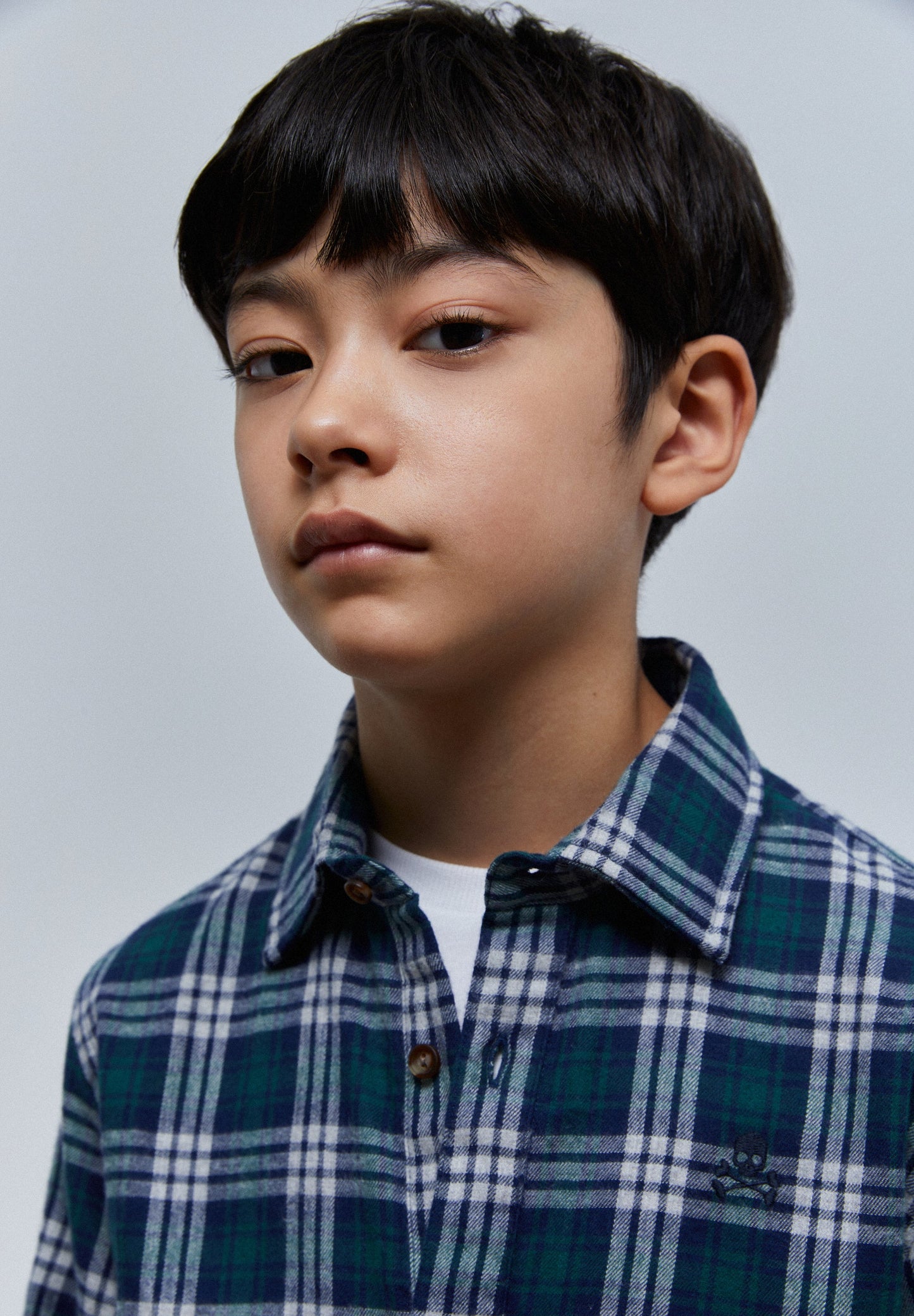 CAMISA POLO COM PADRÃO TARTAN