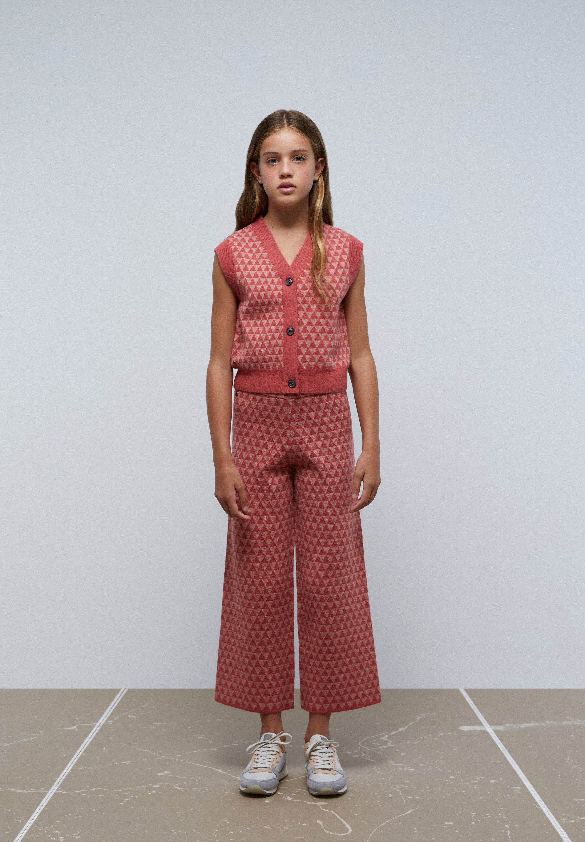 CALÇAS DE MALHA COM TRIÂNGULOS