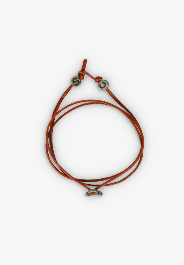 PULSEIRA COM SKULL E CORDÃO EM PELE