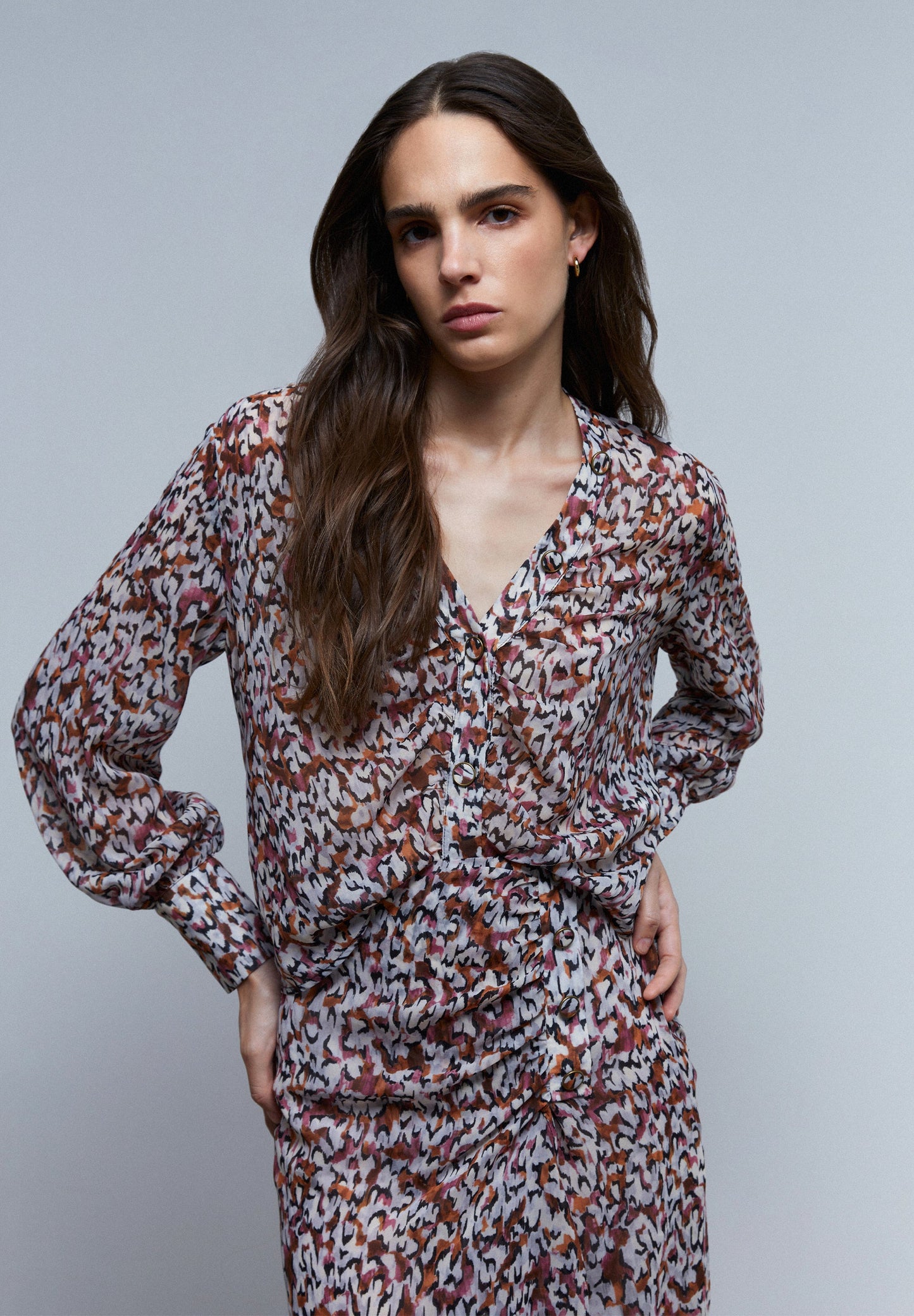 BLUSA COM PADRÃO DRAPEADA