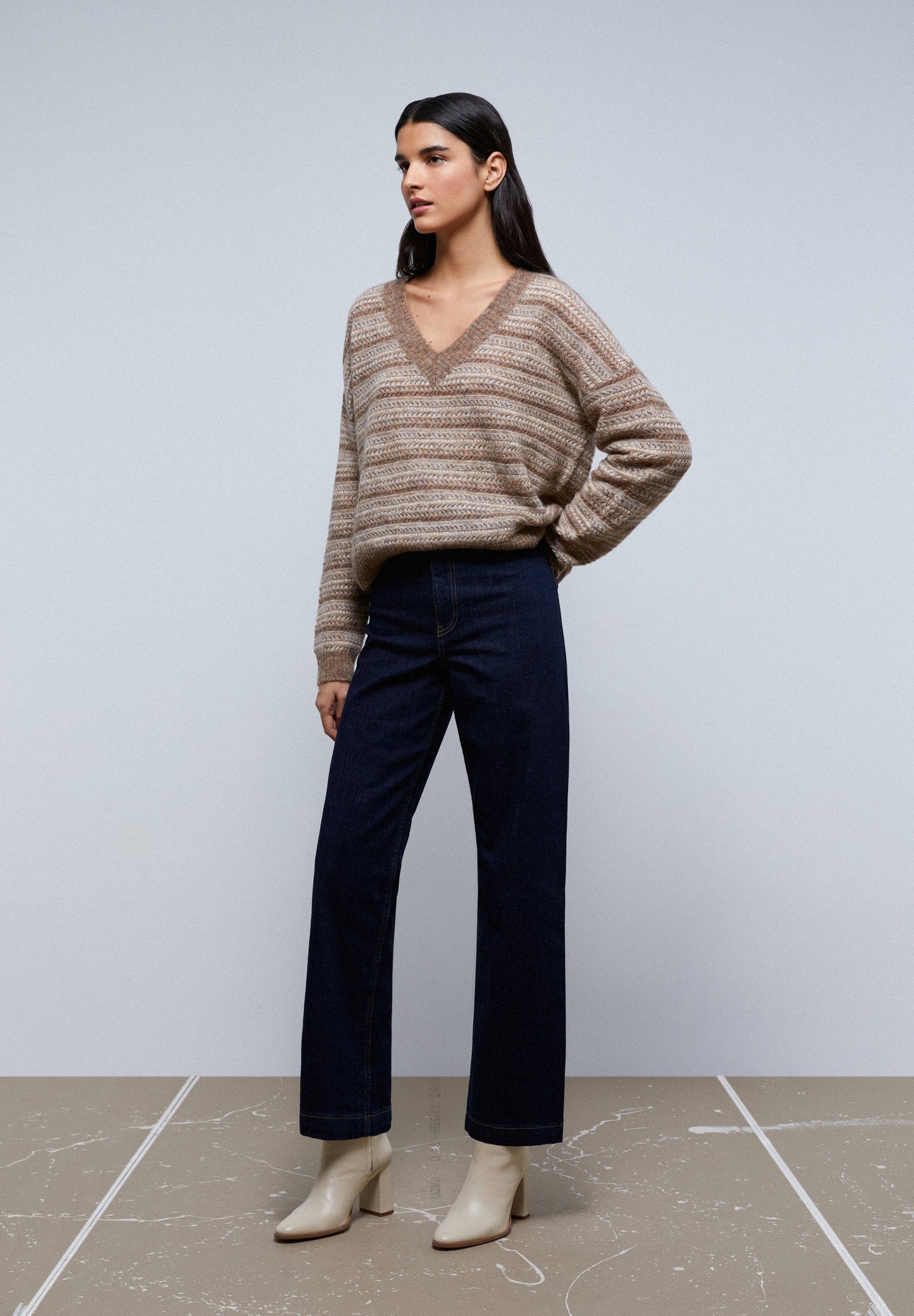 SWEATER DE MALHA ÀS RISCAS