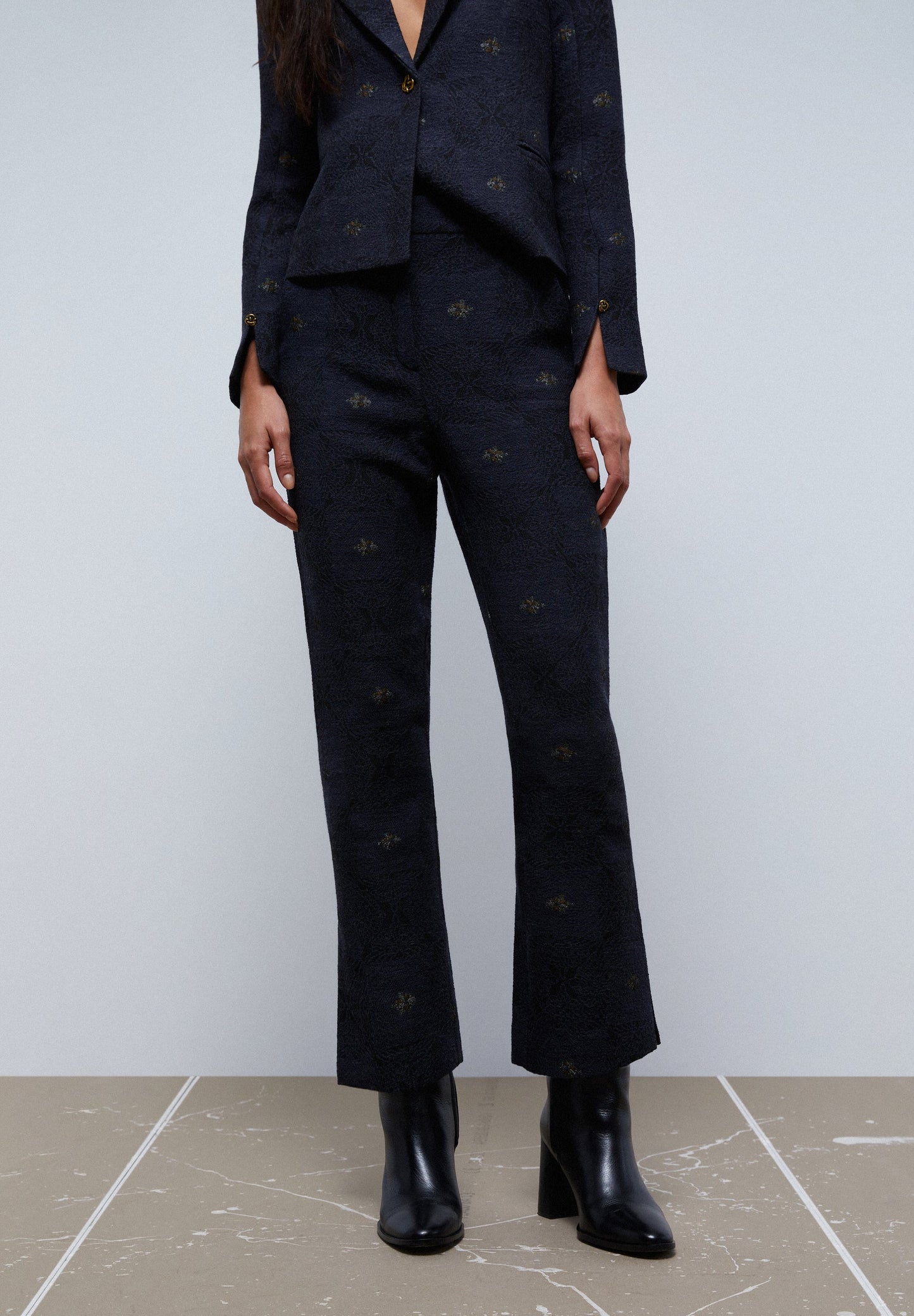 CALÇAS BOCA DE SINO COM MOTIVOS