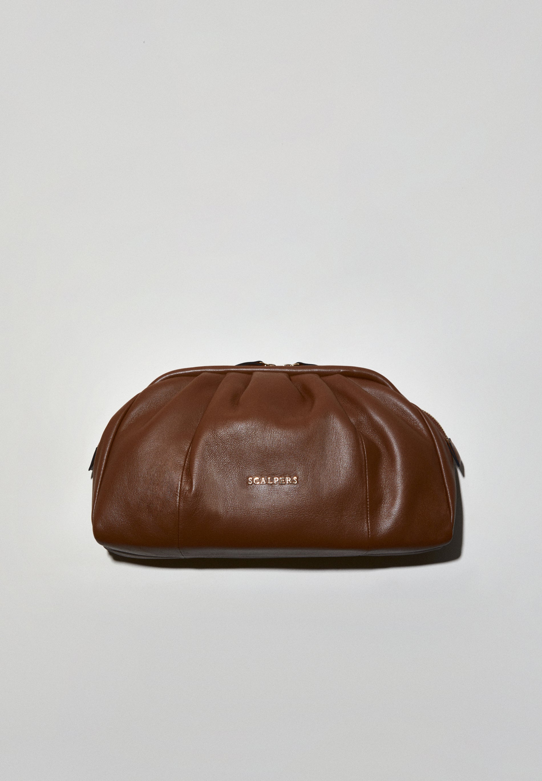 BOLSA CLUTCH EM PELE COM FRANZIDOS