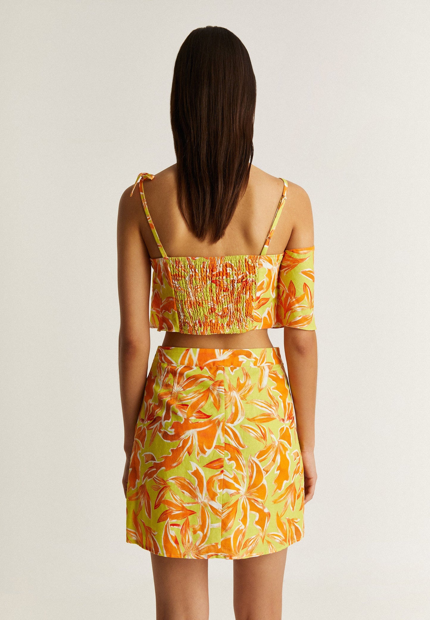 TOP ASSIMÉTRICO COM FOLHO