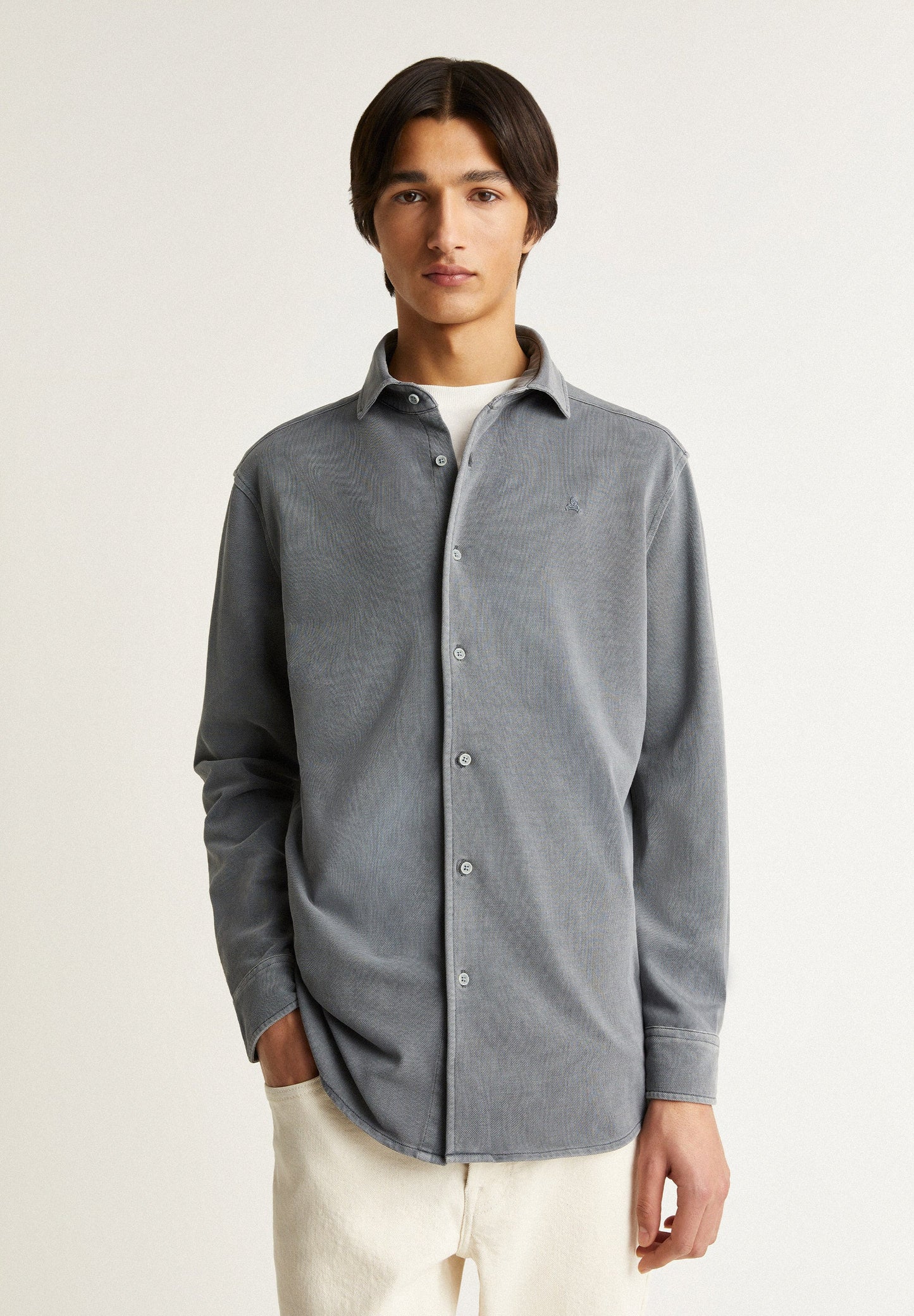 CAMISA DE PIQUÉ COM SKULL NO TOM