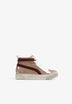 SAPATILHAS DE CANO ALTO COM TACHAS