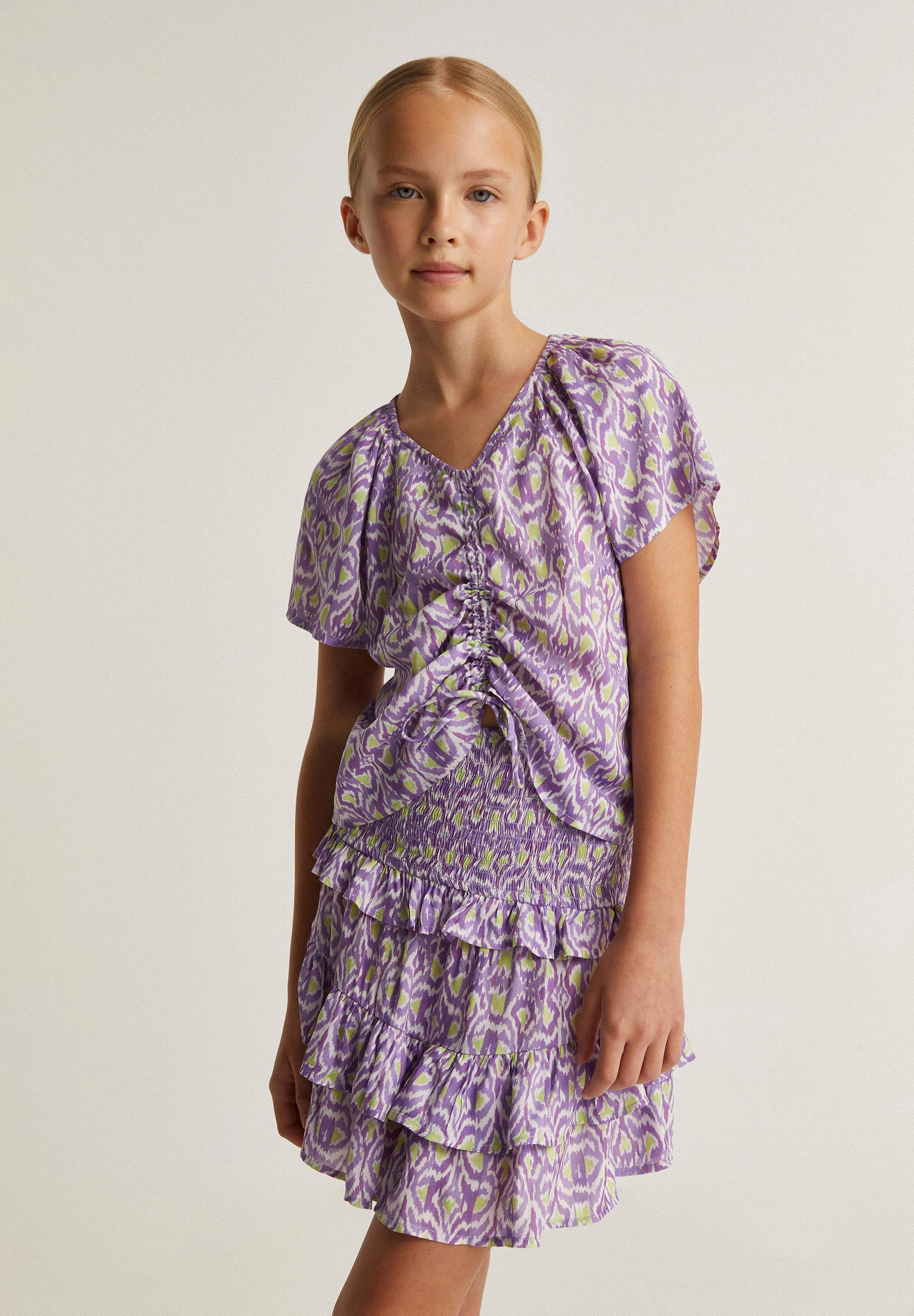 BLUSA IKAT COM FRANZIDO