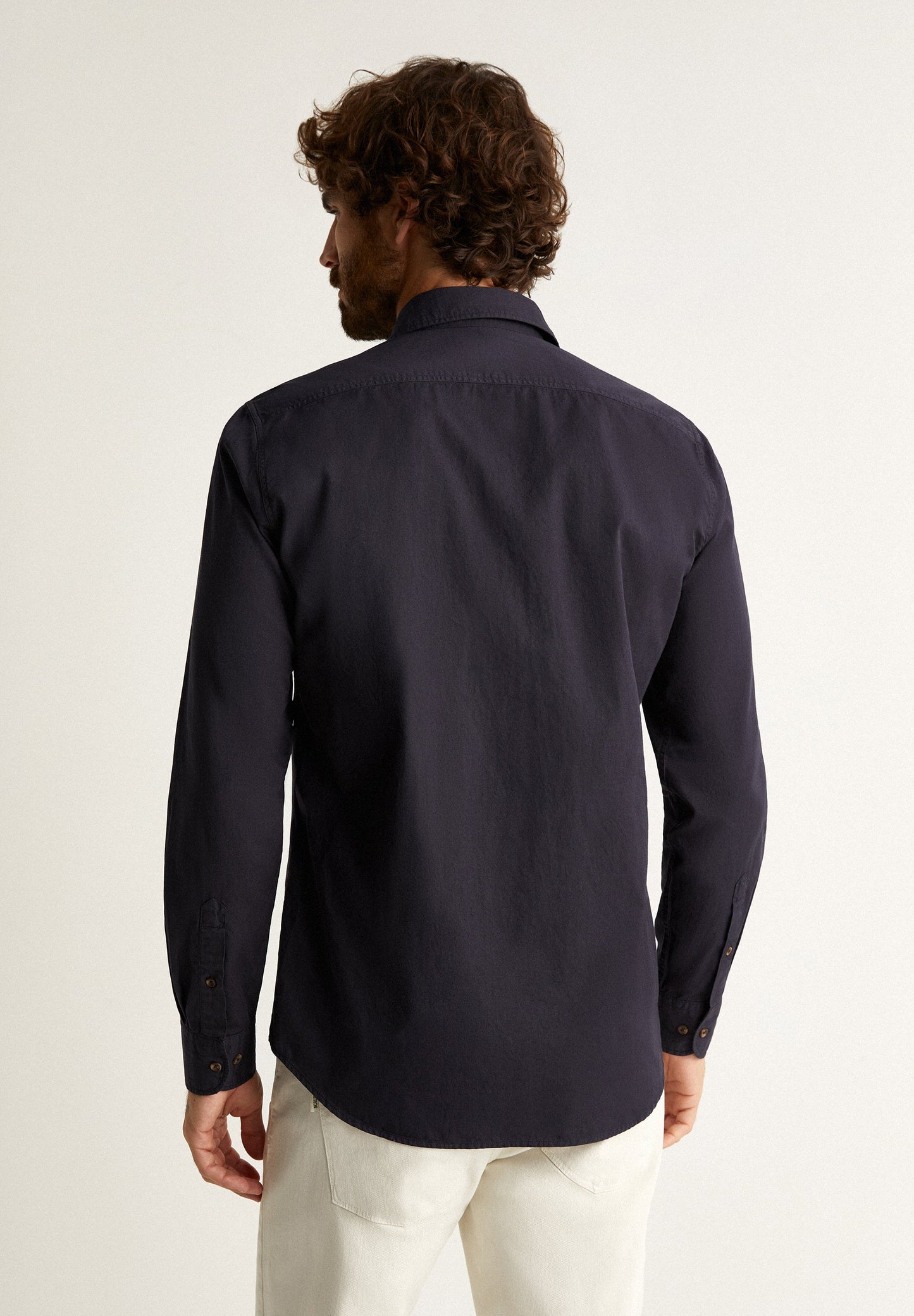 CAMISA COM BOLSOS BOTÃO
