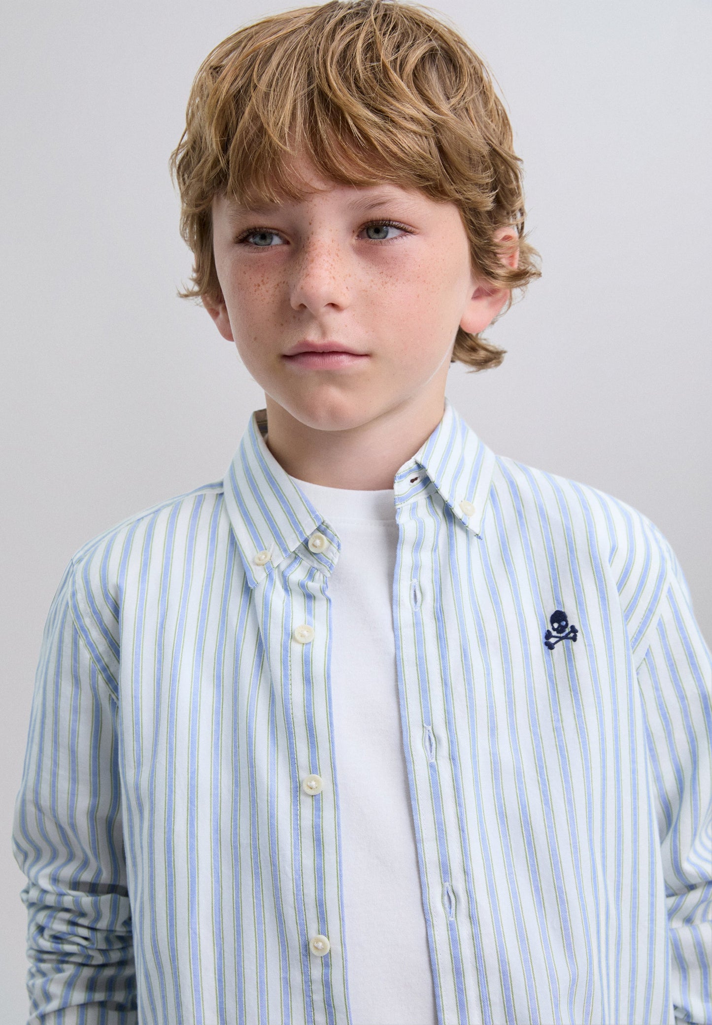 CAMISA ÀS RISCAS COM SKULL