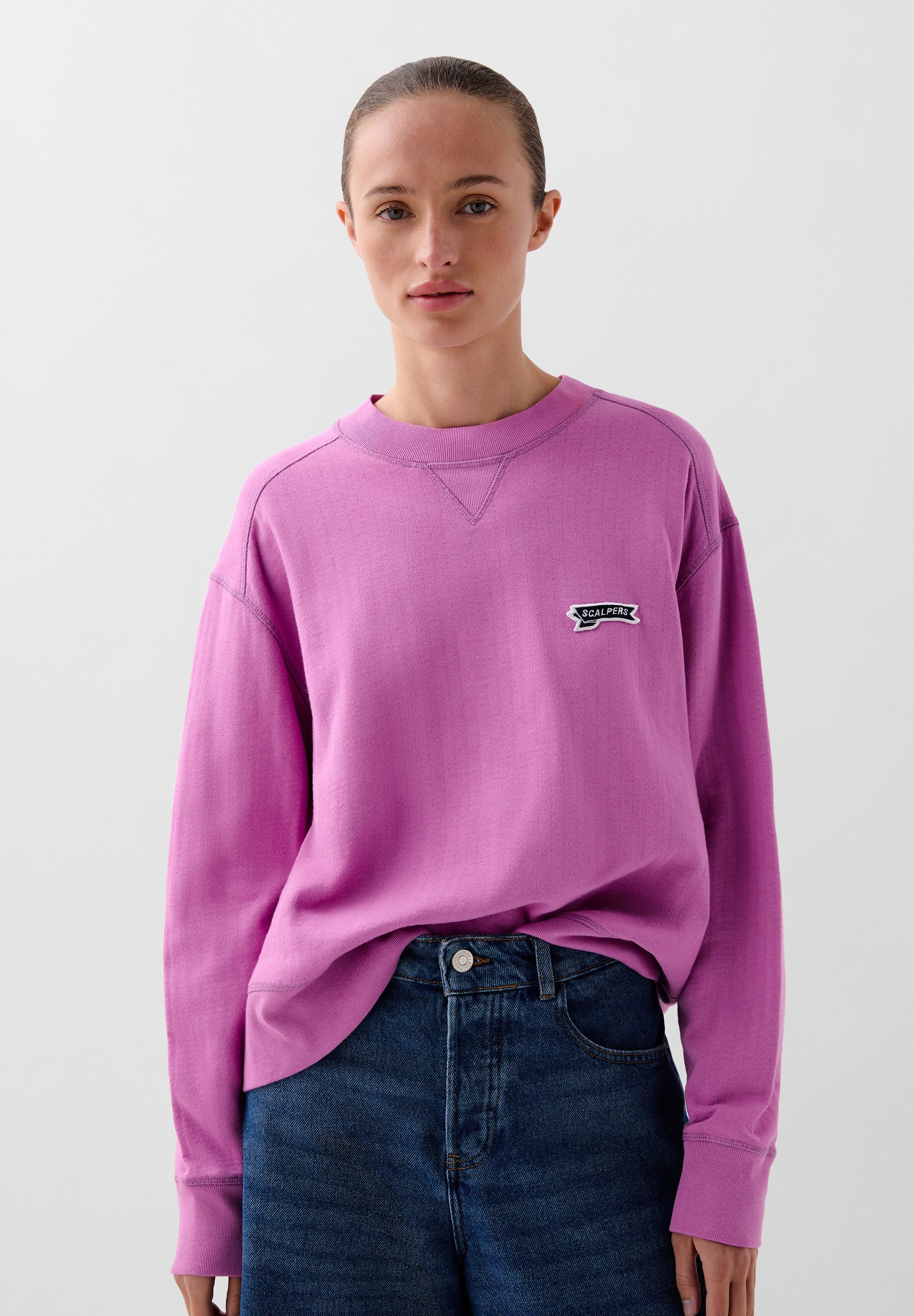 SWEATSHIRT COM REMENDO DE LOGÓTIPO