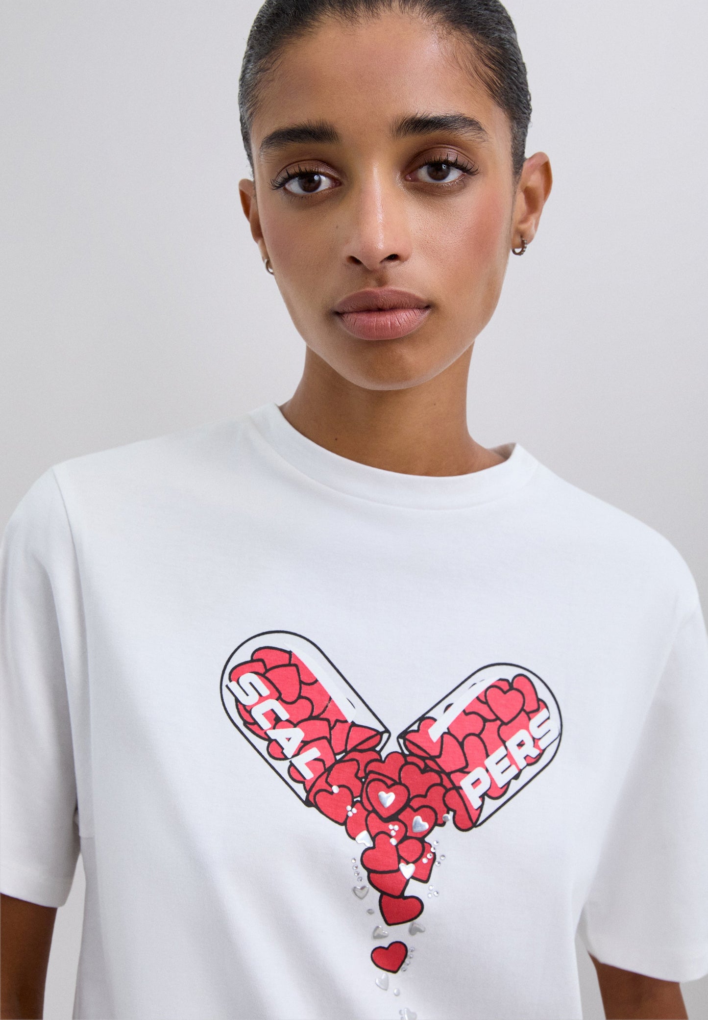 T-SHIRT COMPRIMIDO SCP