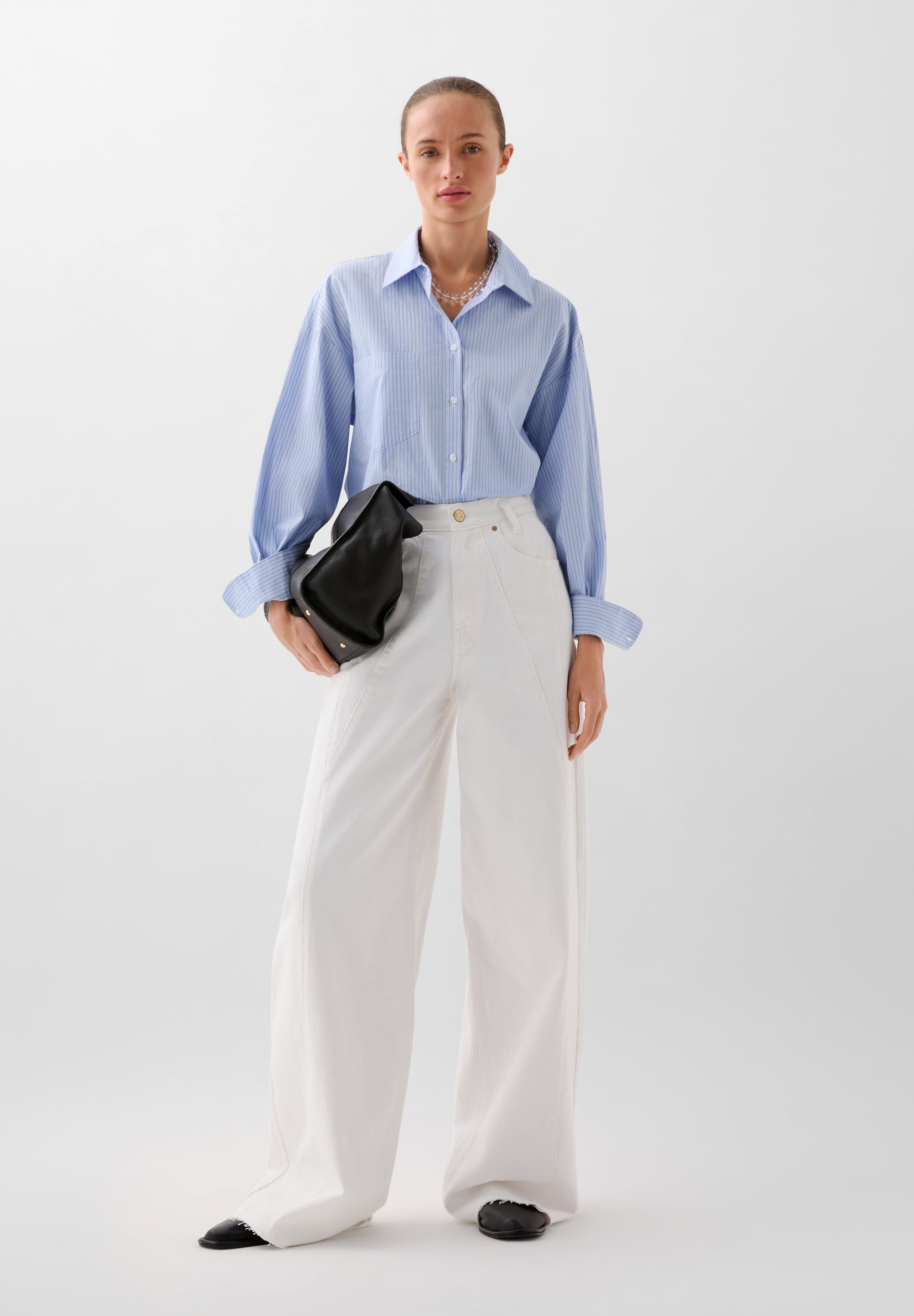 JEANS COM COSTURA E CINTURA SUBIDA