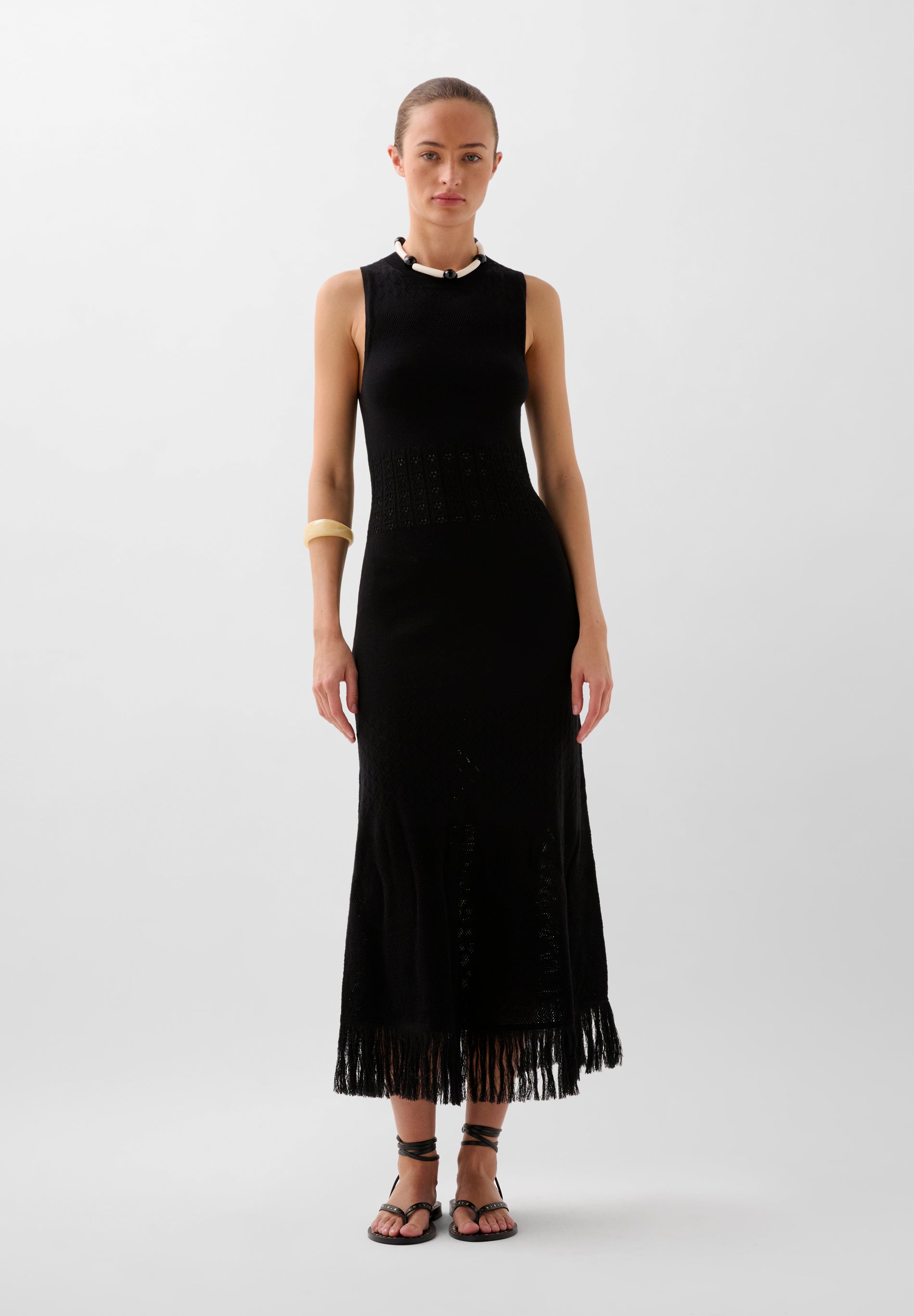 VESTIDO EM MALHA COM FRANJAS