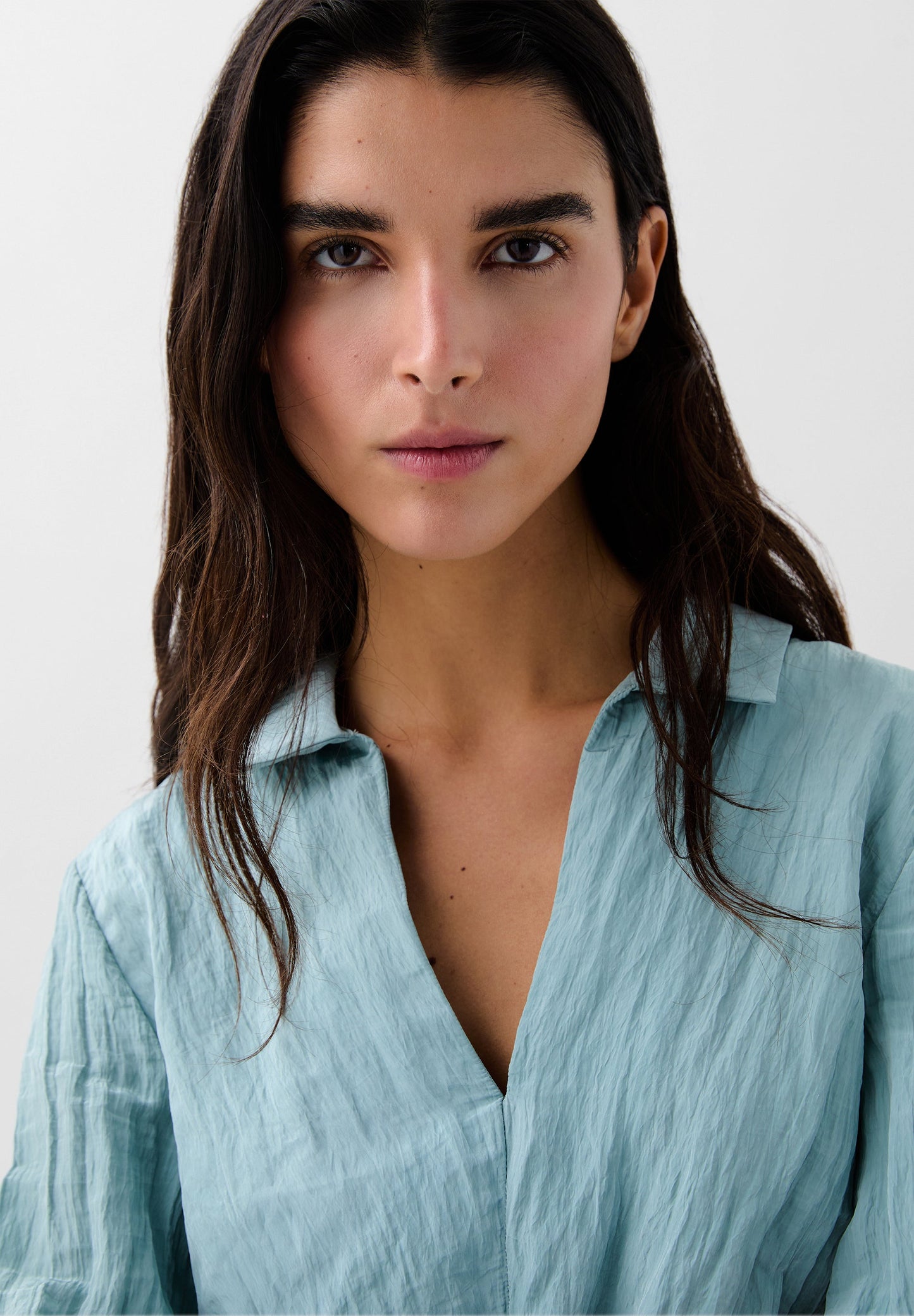 BLUSA COM TEXTURA FLUIDA