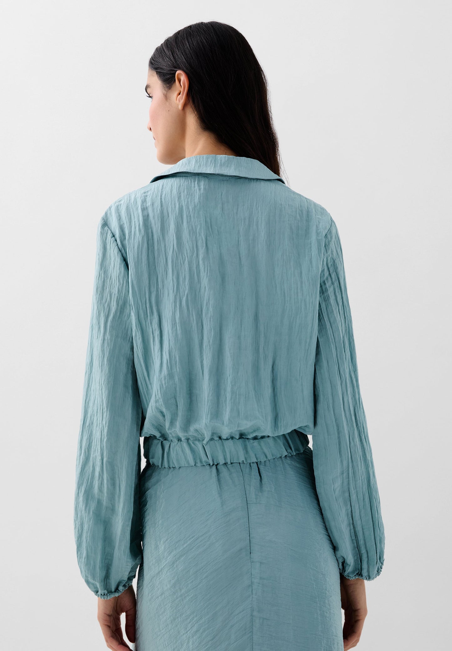 BLUSA COM TEXTURA FLUIDA