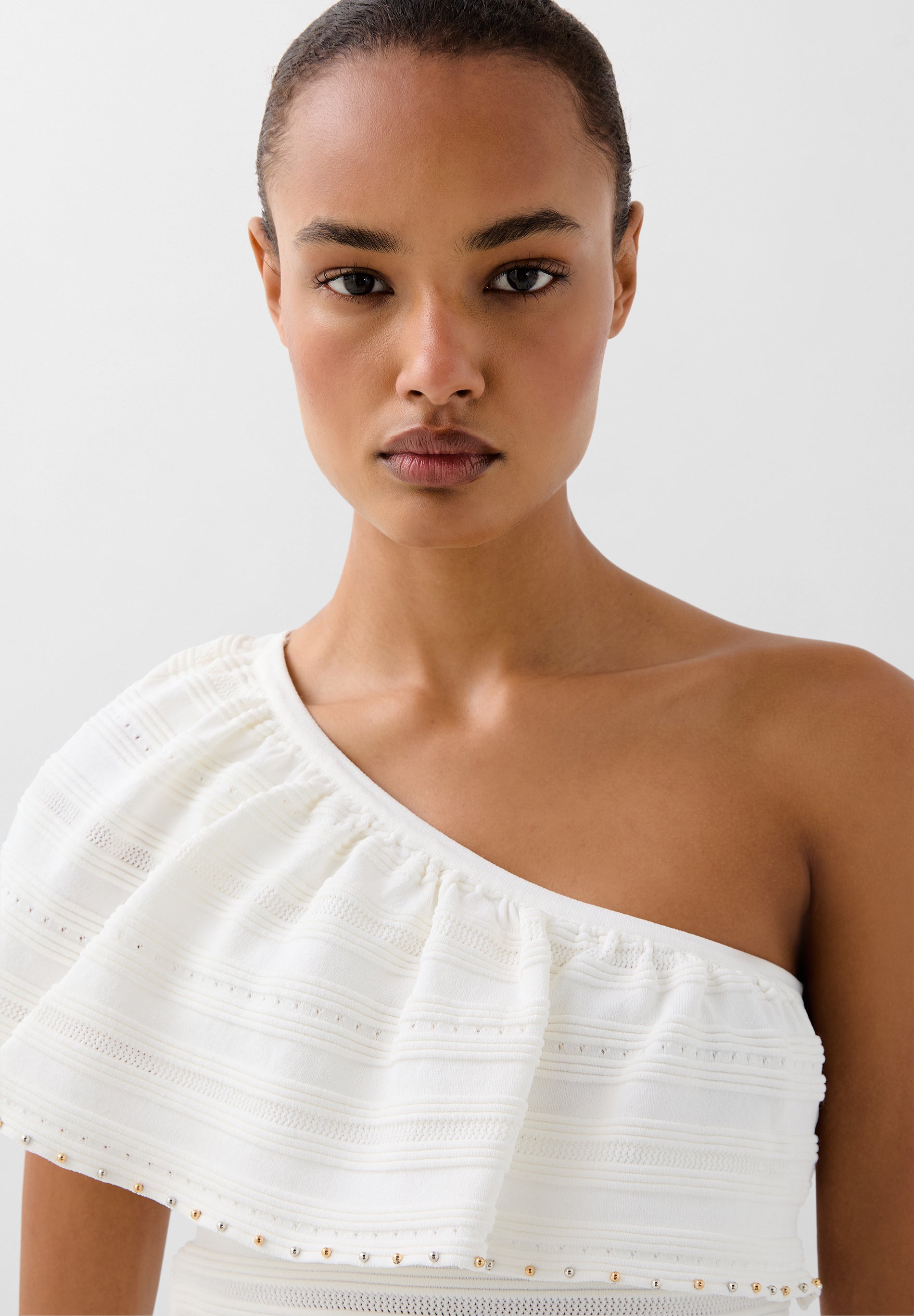 TOP DE MALHA COM TACHAS SCASY