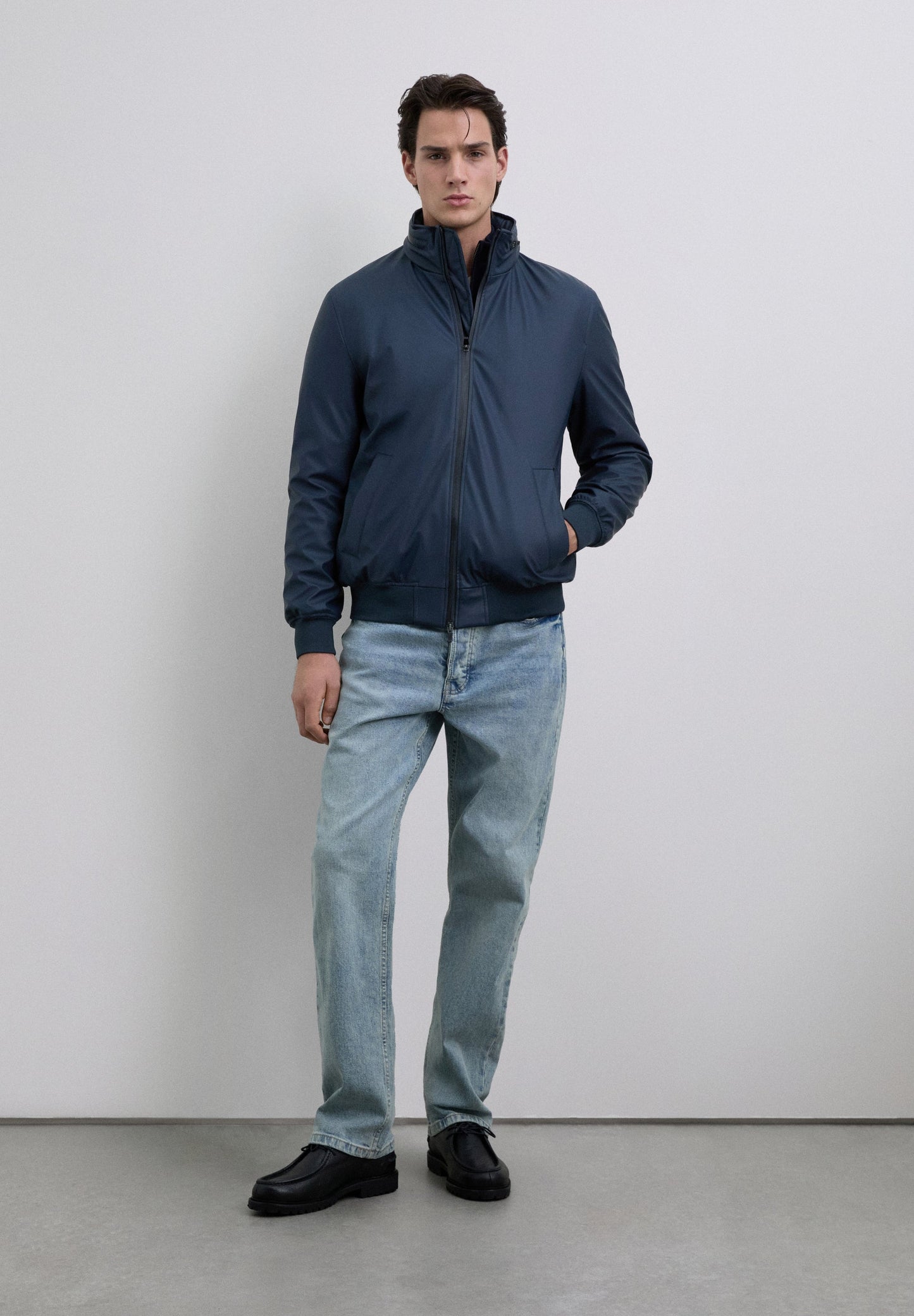 CARDIGAN COM CAPUZ IMPERMEÁVEL