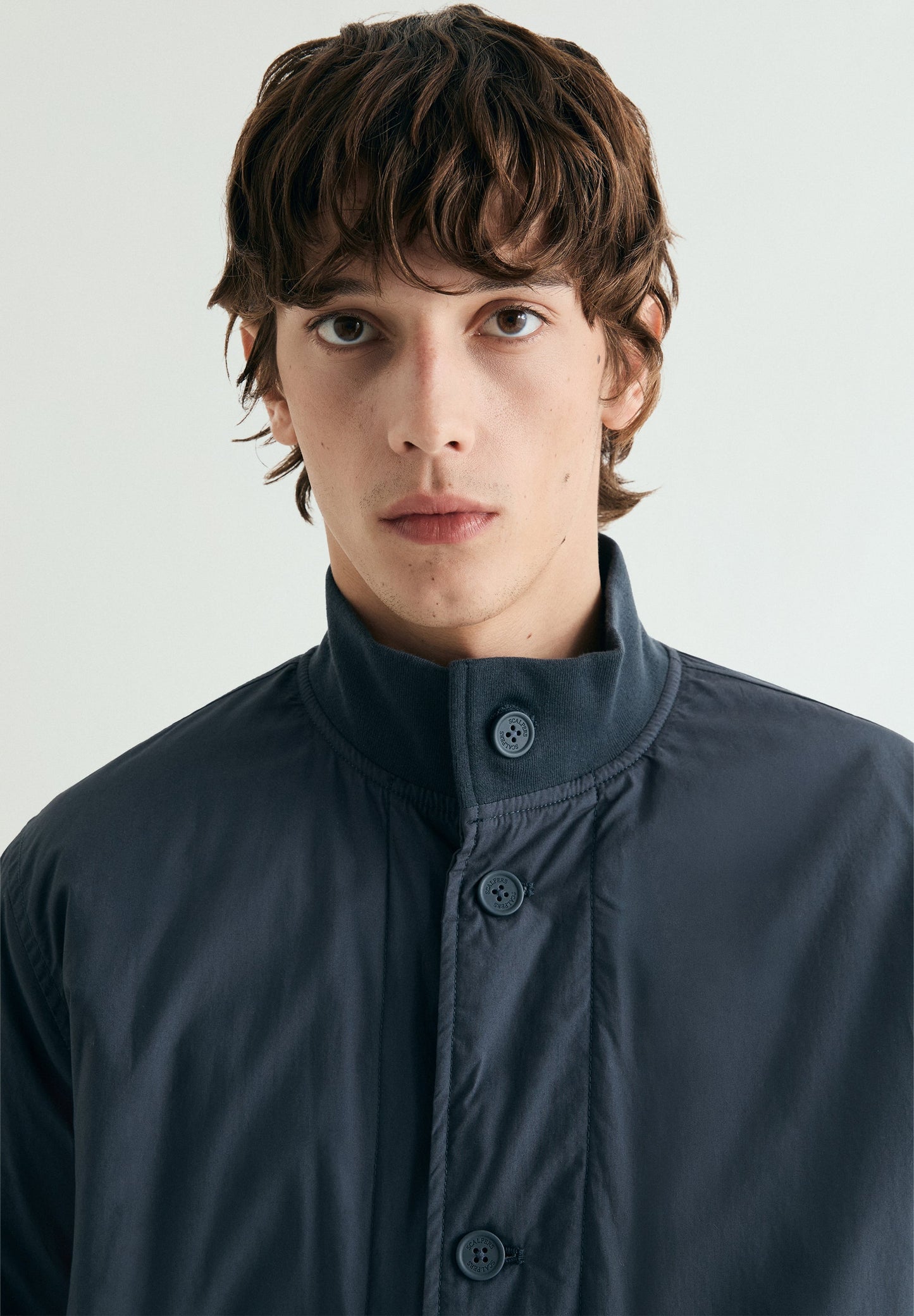 CARDIGAN ABOTOADO COM BOLSOS