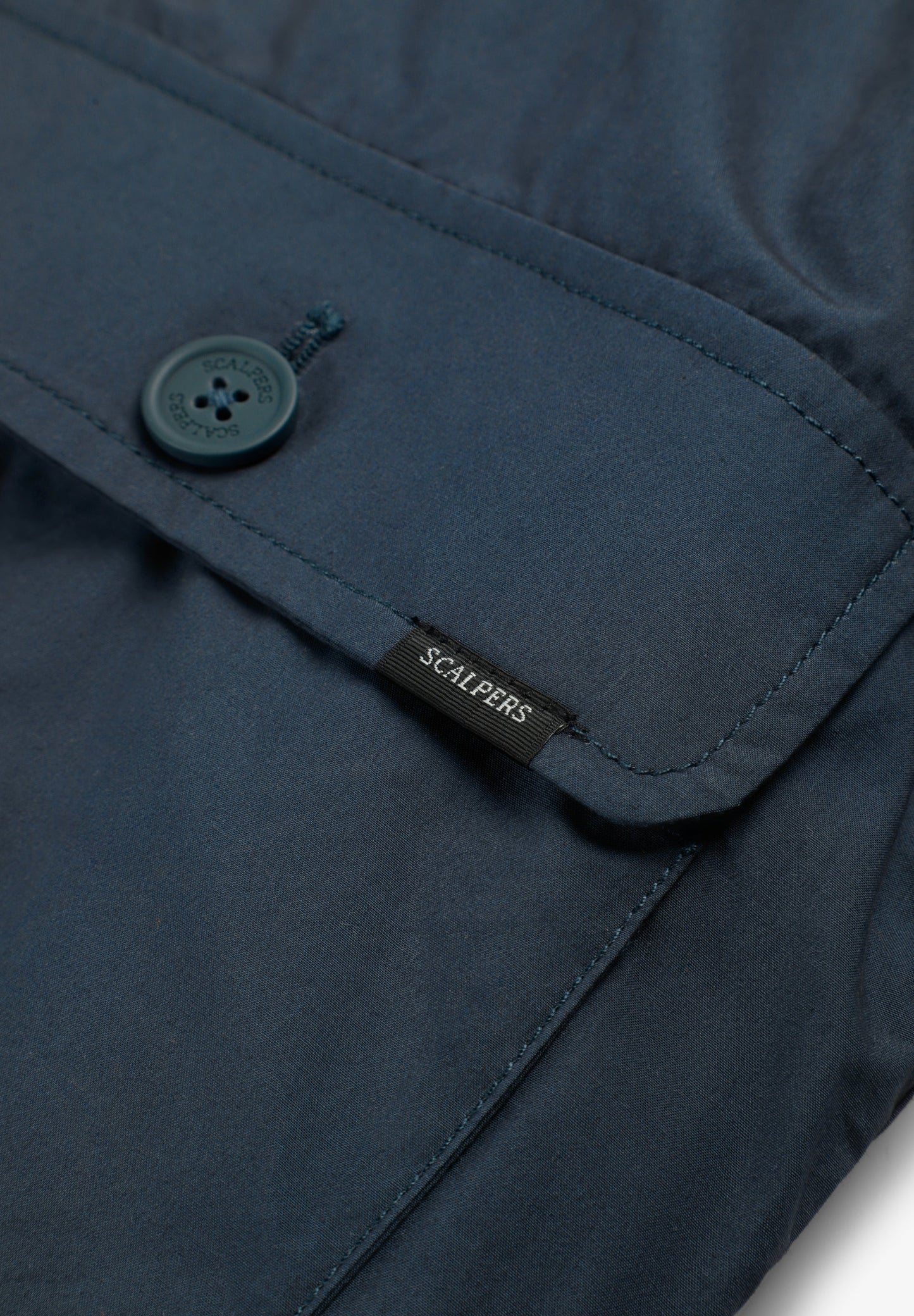 CARDIGAN ABOTOADO COM BOLSOS
