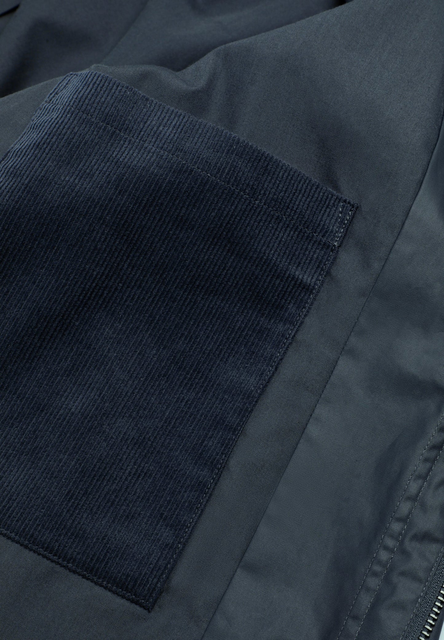 CARDIGAN ENCERADO COM BOTÕES DE PRESSÃO