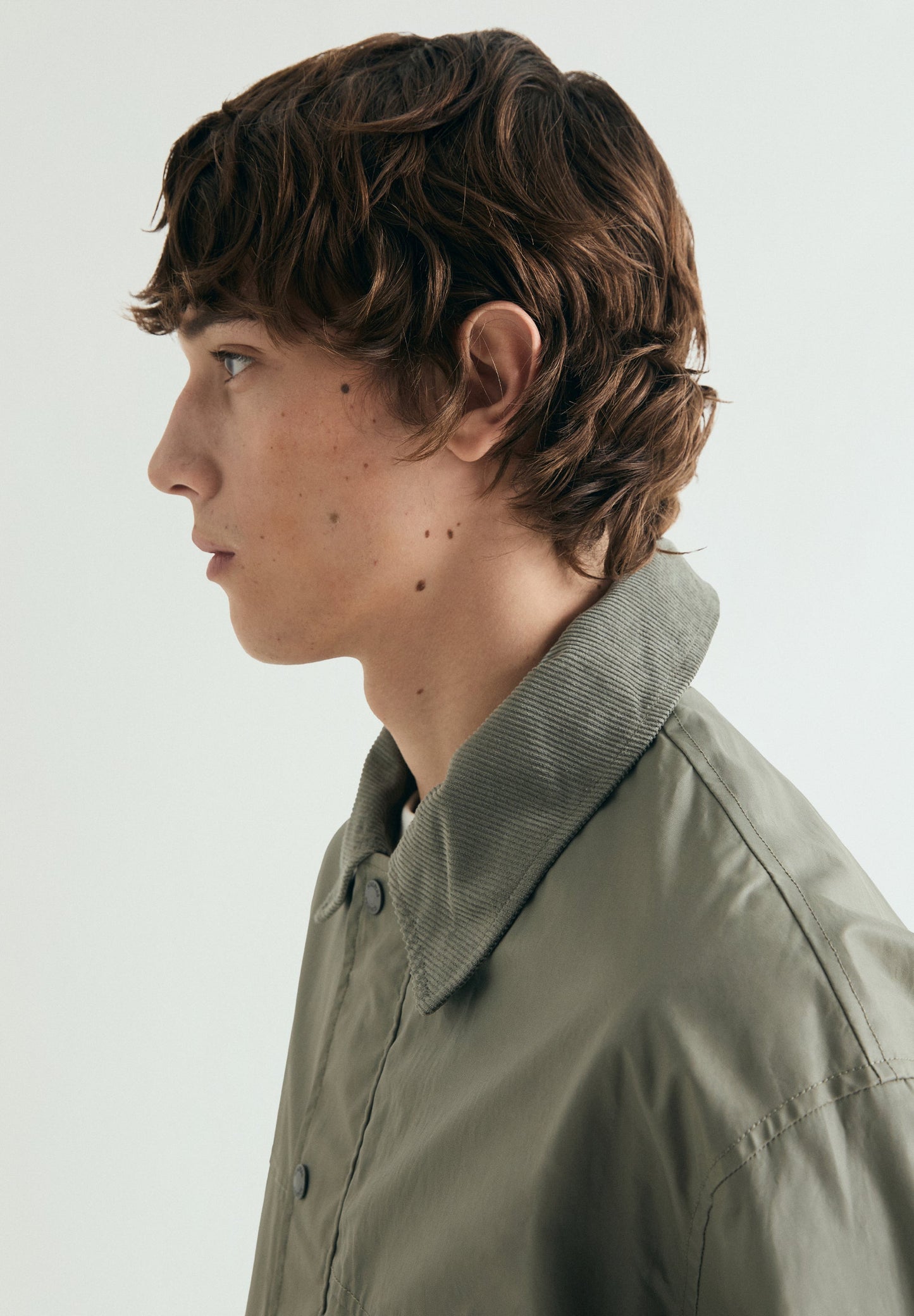 CARDIGAN ENCERADO COM BOTÕES DE PRESSÃO